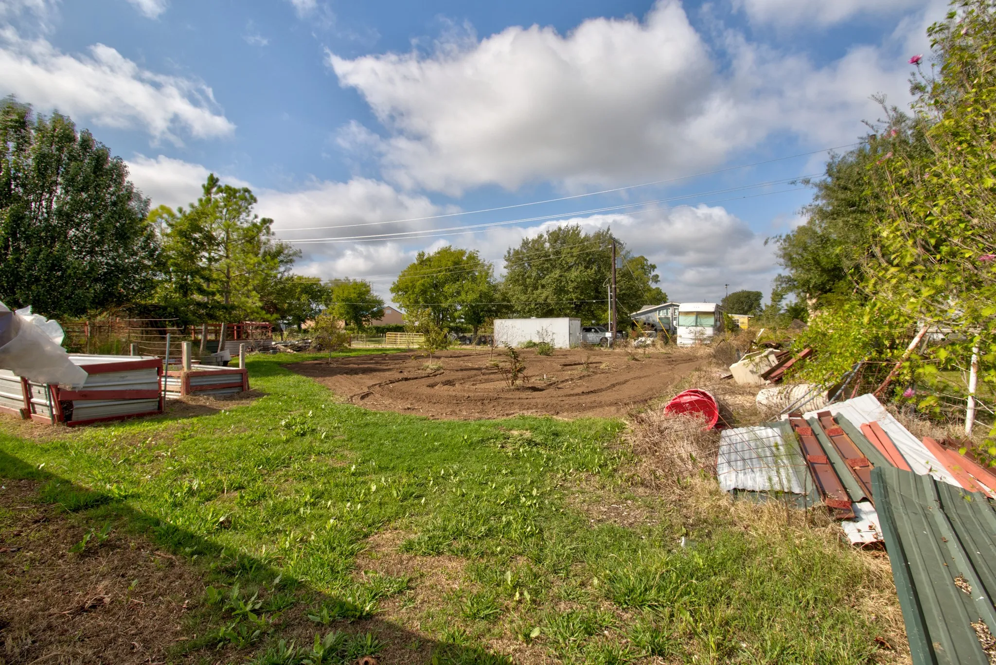 Expansive lot featuring cleared ground and mature trees