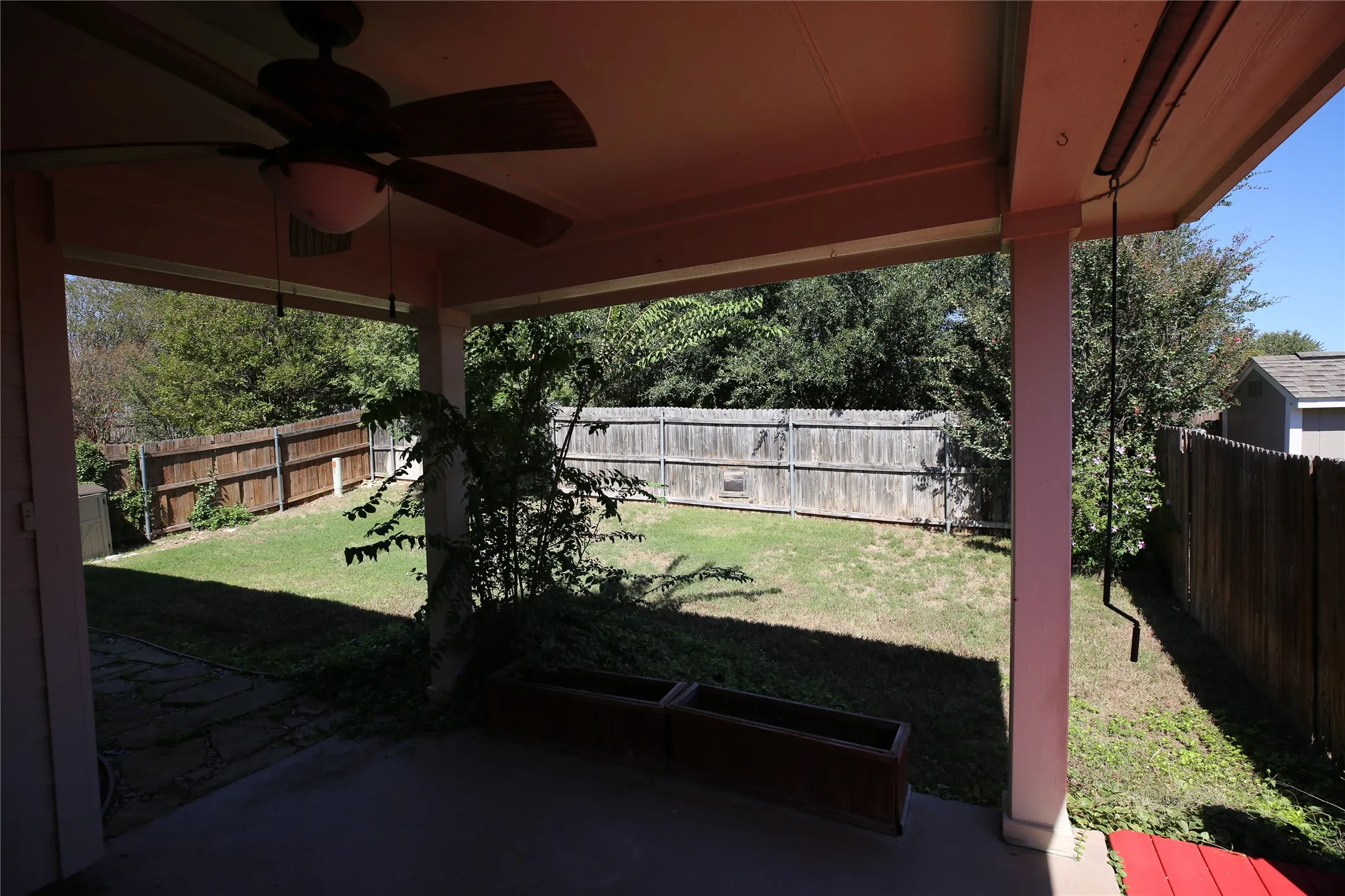 Covered porch and backyard