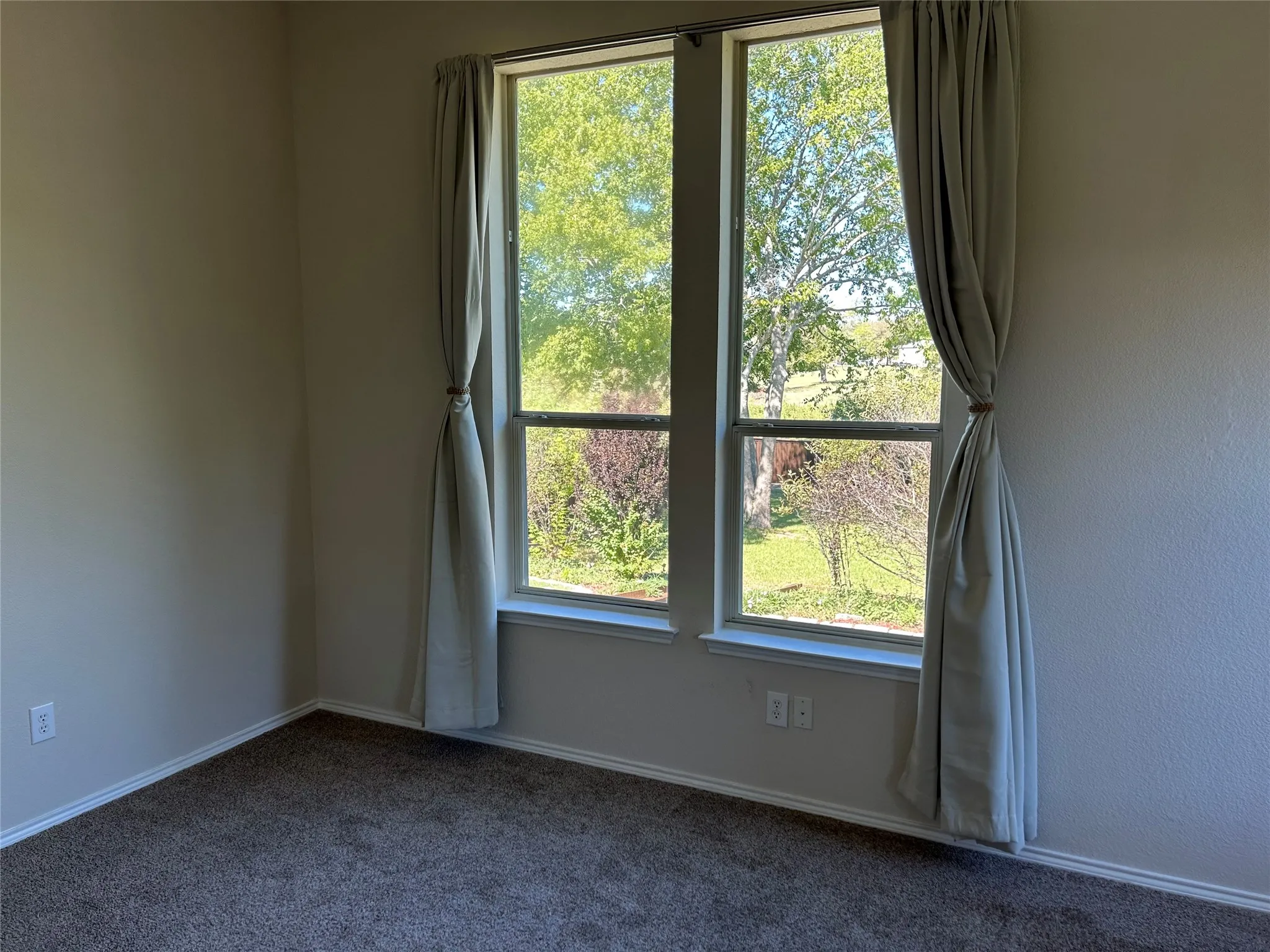 View from master bedroom to backyard