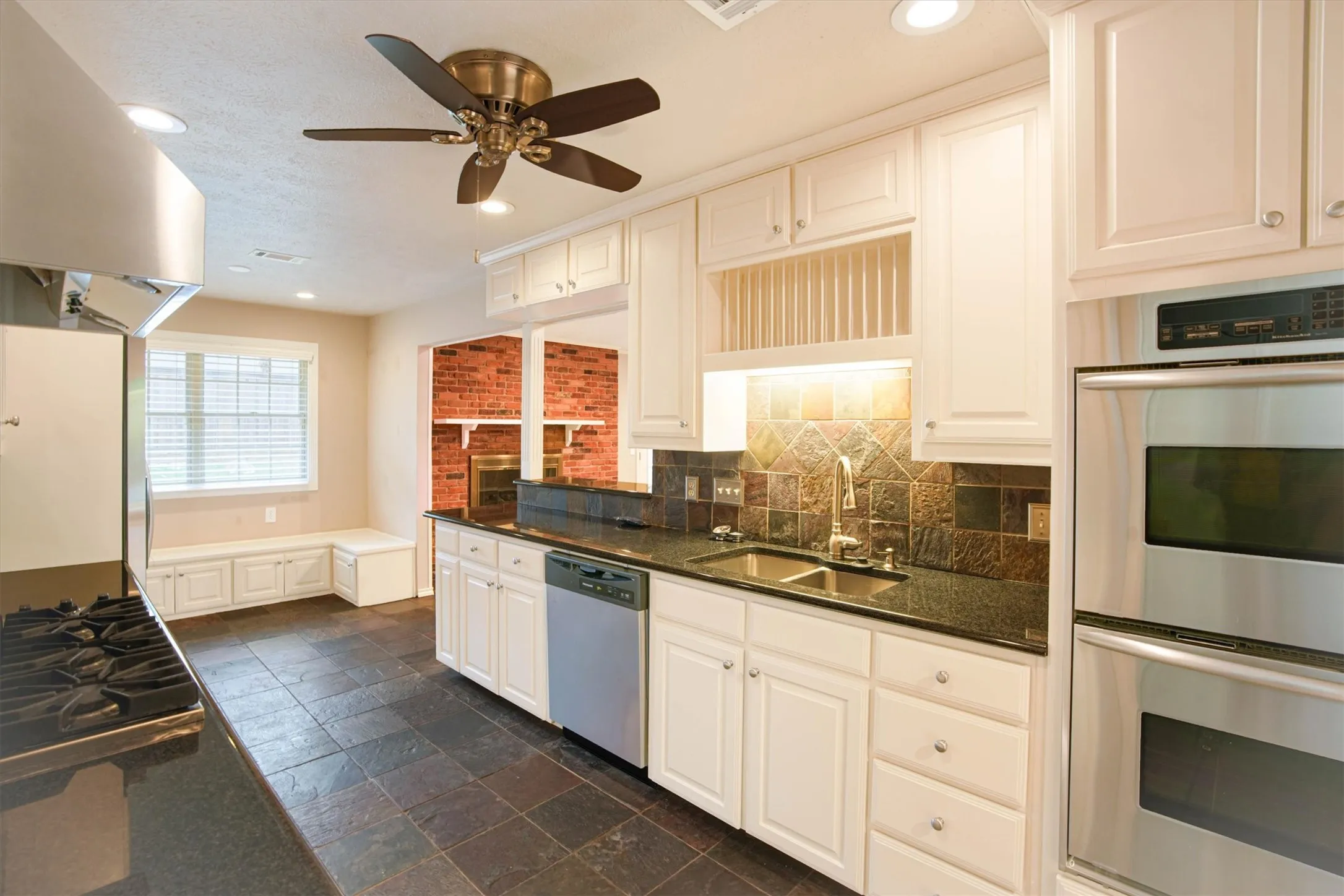 Generous cabinet and counter space with stainless steel appliances