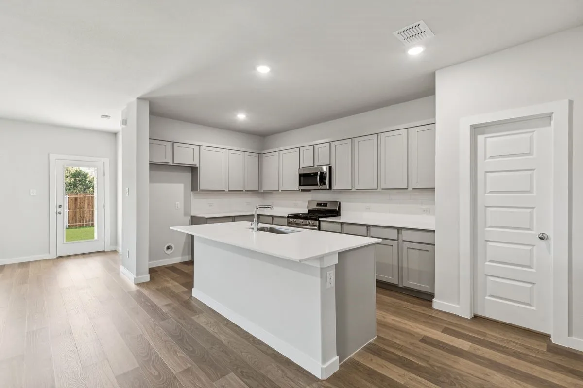 Kitchen in the Oscar home plan – REPRESENTATIVE PHOTO