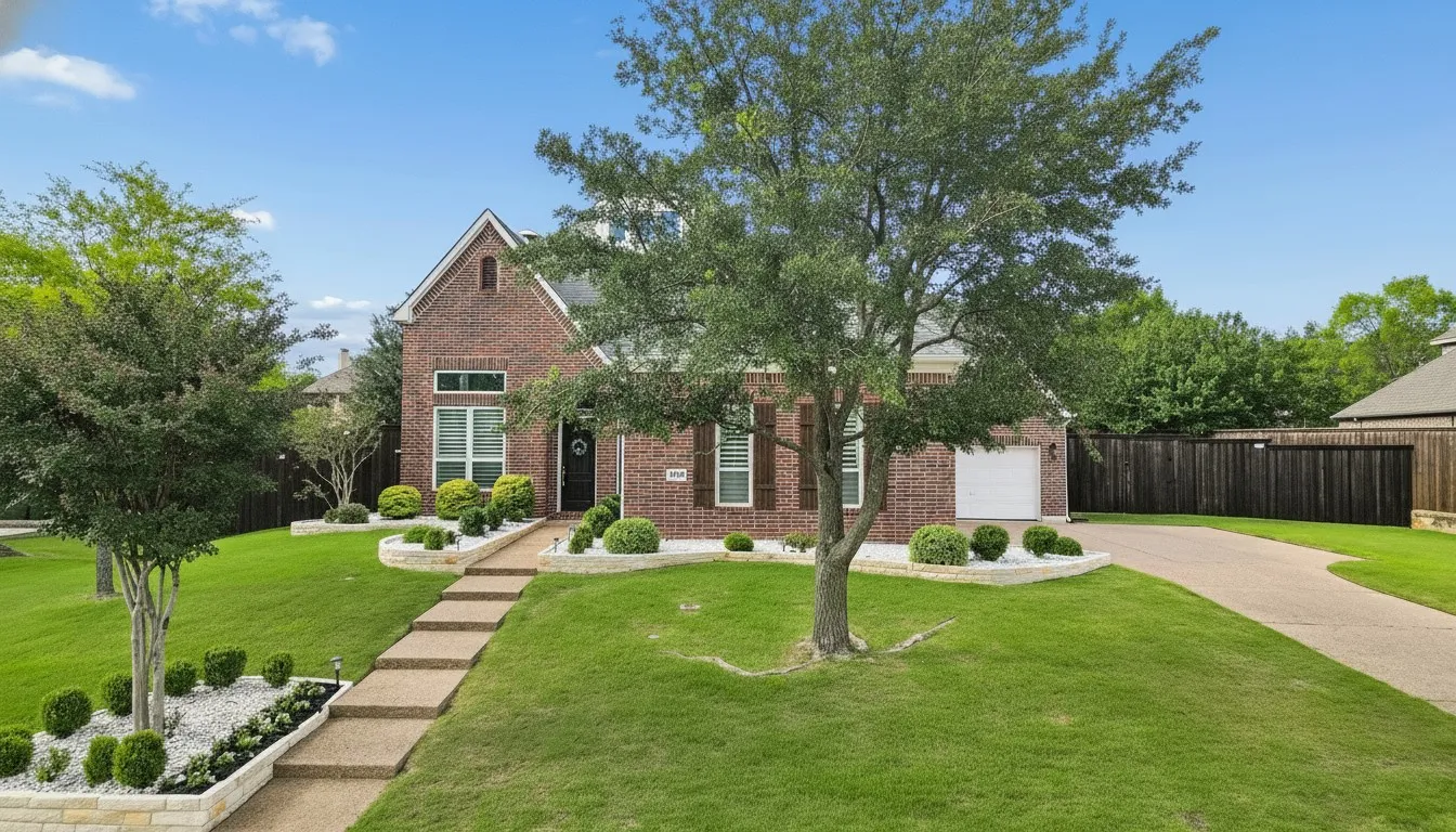 Front of home featuring mature landscaping and
inviting curb appeal.