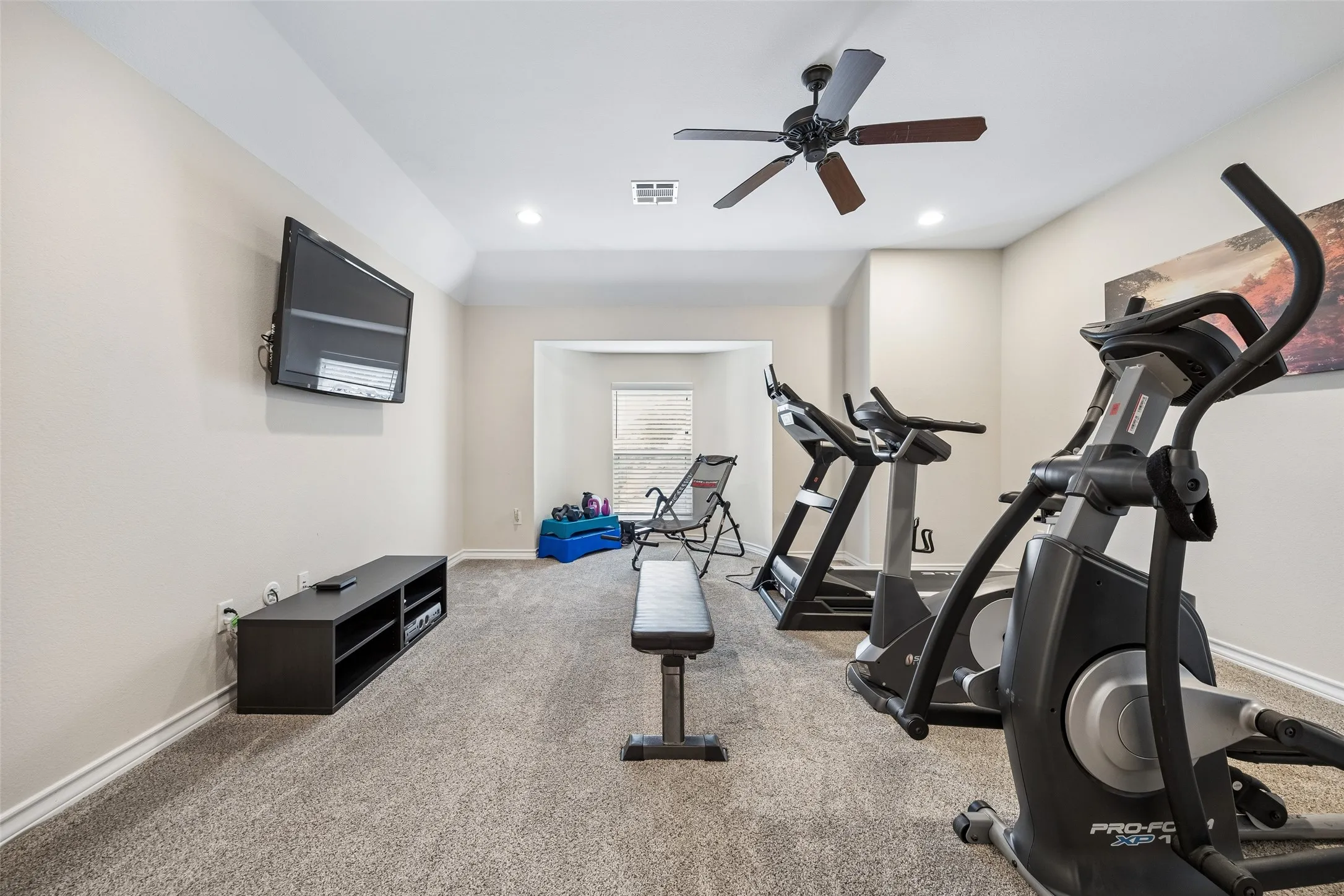 Versatile game room with abundant space for
recreation, fitness, or a secondary living area,
conveniently located near the media room and guest bedroom.