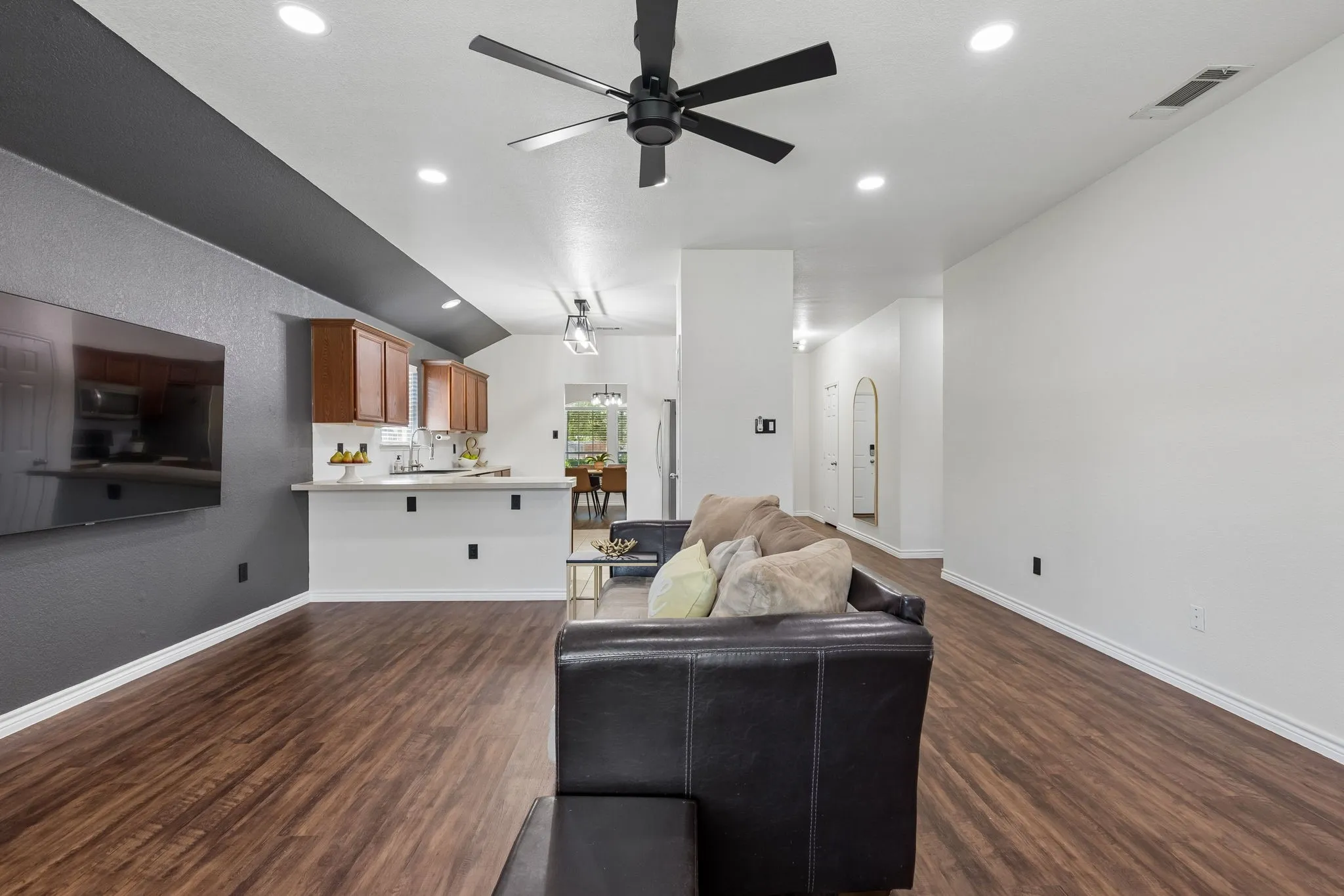 Living room with view of kitchen