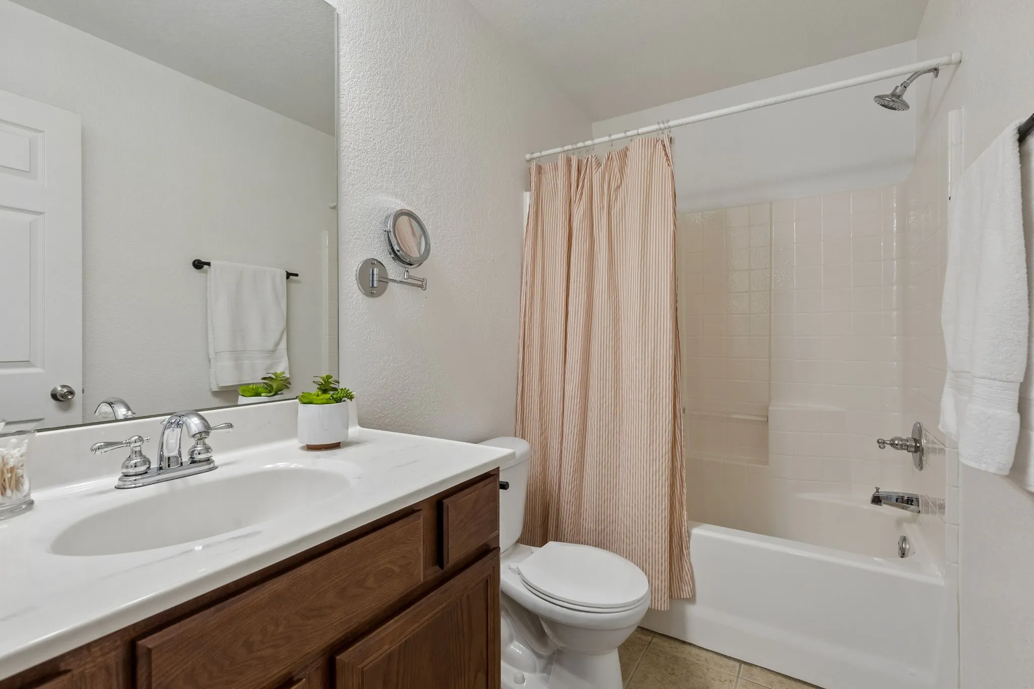 Guest bathroom near guest bedrooms