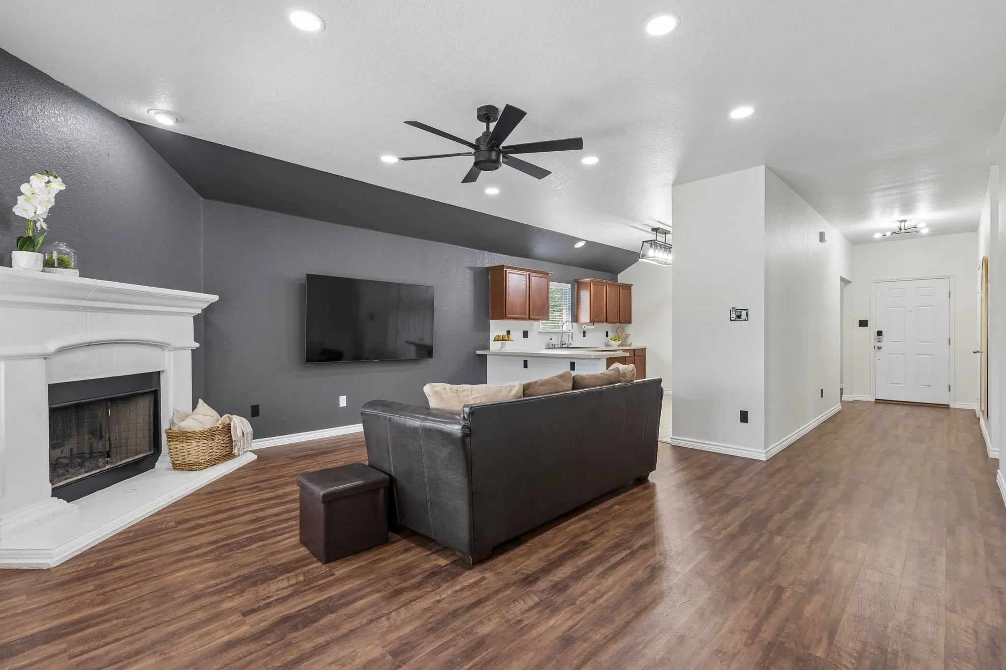 Living room with partial view of kitchen