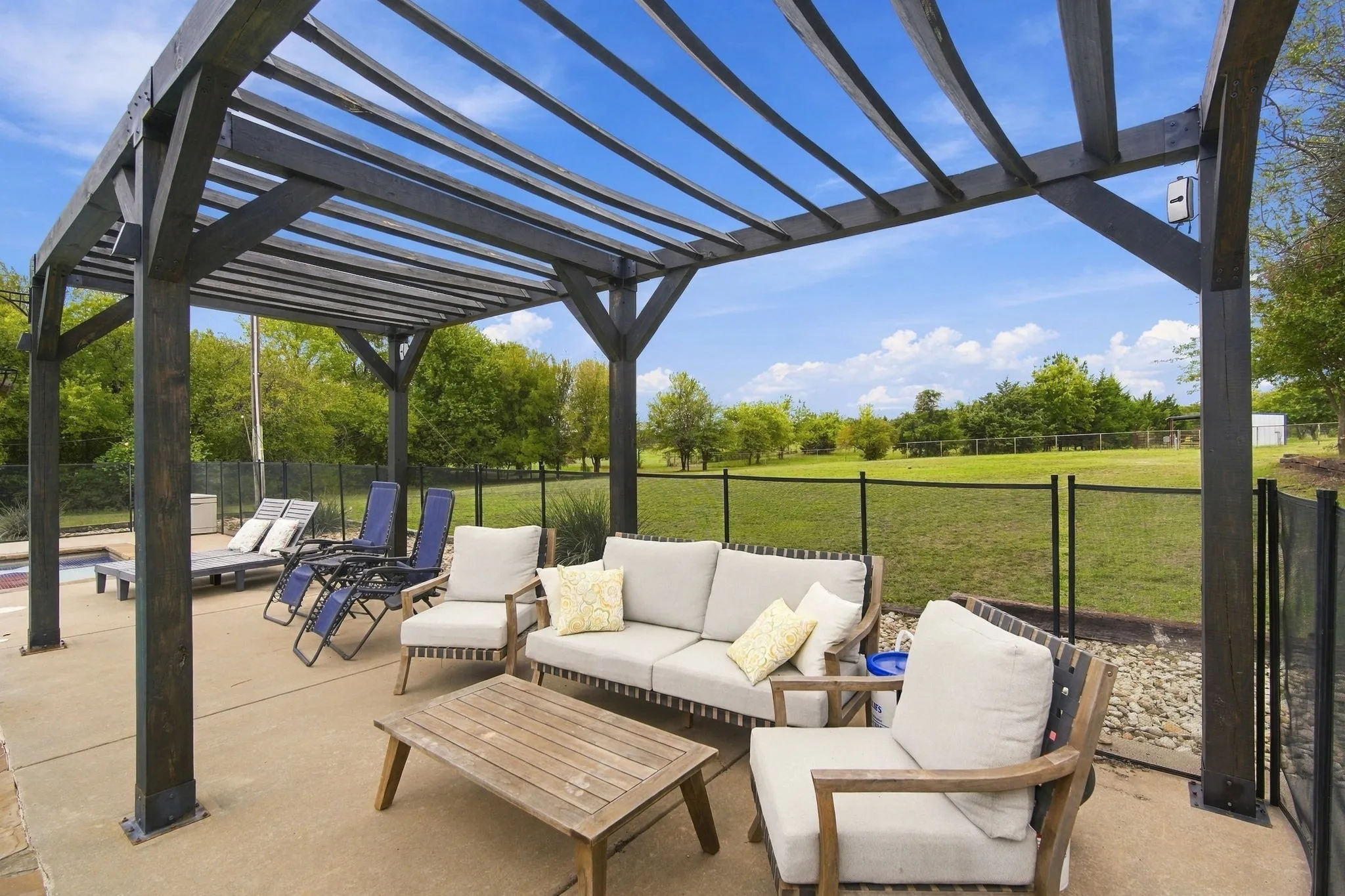 Pergola beside the pool
