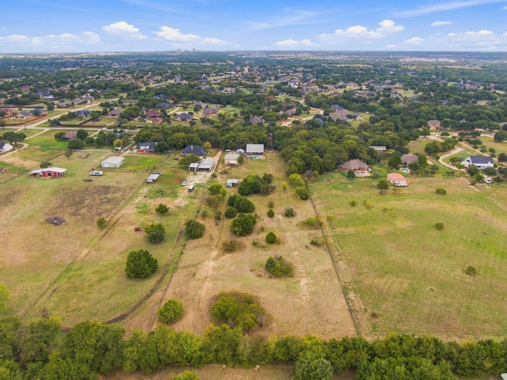 5.5 Acres; 3 acres fenced