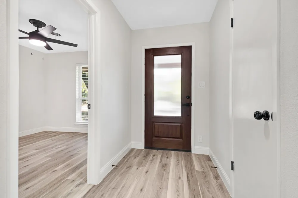 Showing 3rd bedroom off entry.
