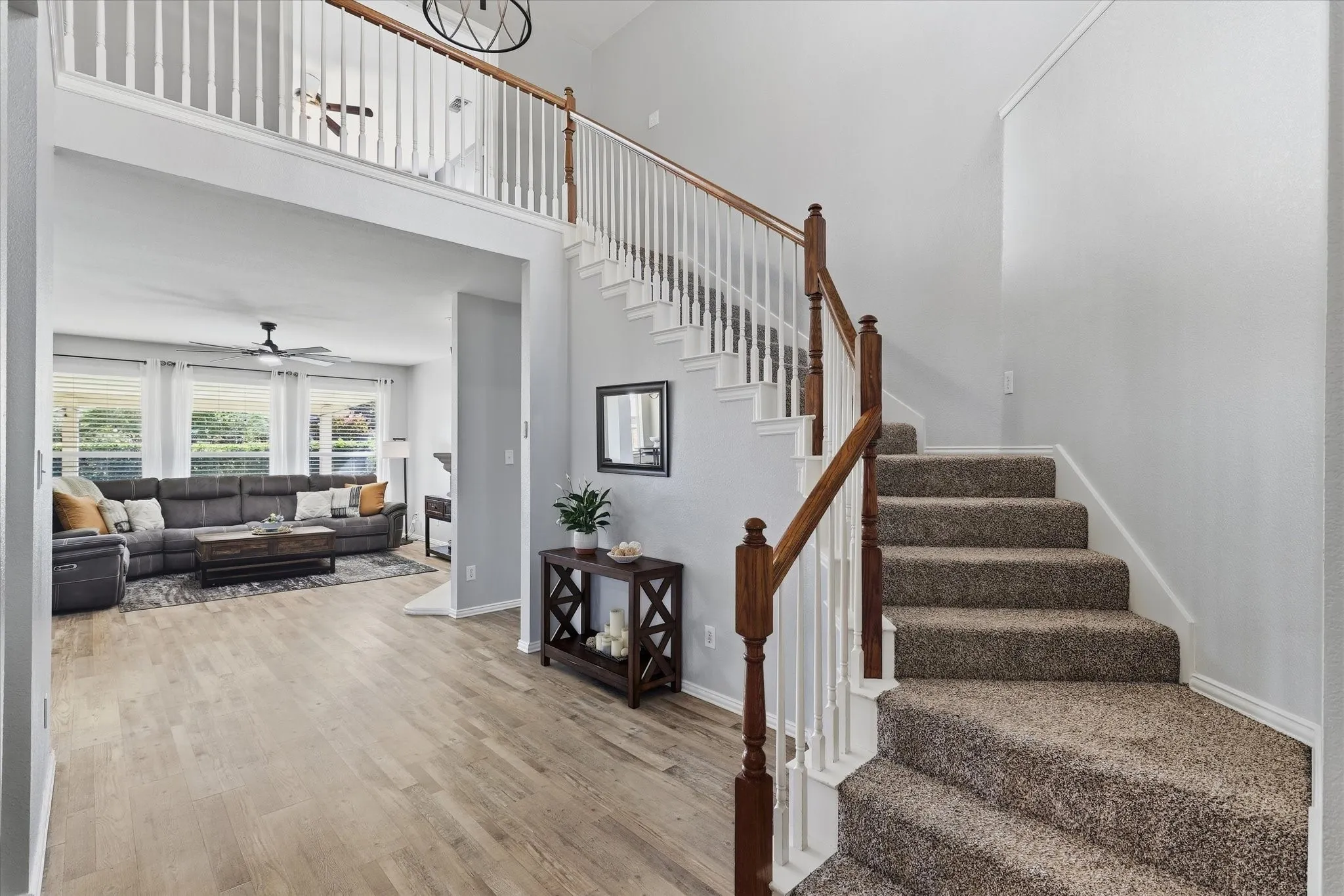 Inside, a two-story foyer, neutral color palette & luxury vinyl plank flooring throughout the first floor create a cohesive and welcoming feel.