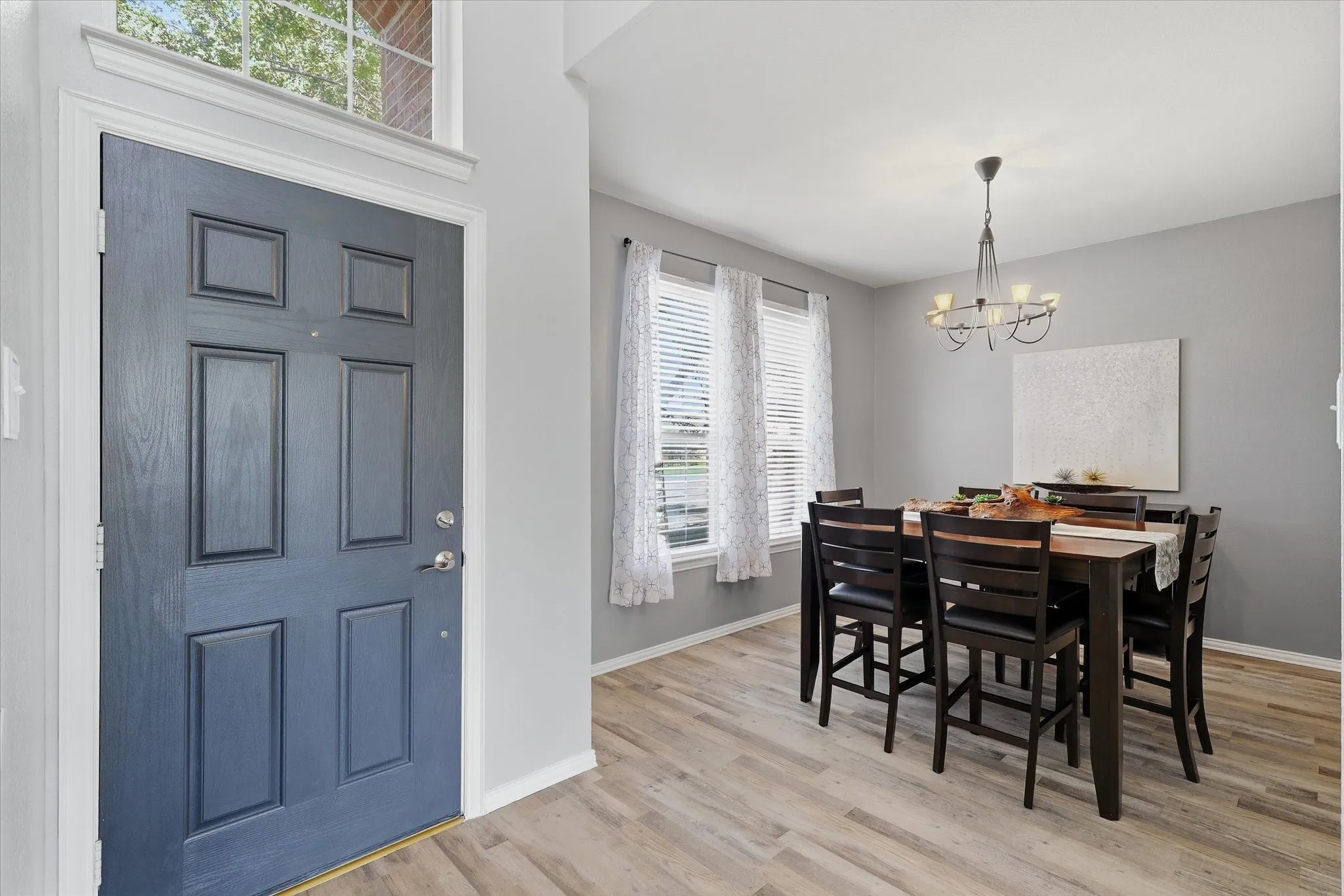 Just off the foyer, the separate dining room offers a bright setting for everyday meals & special gatherings.