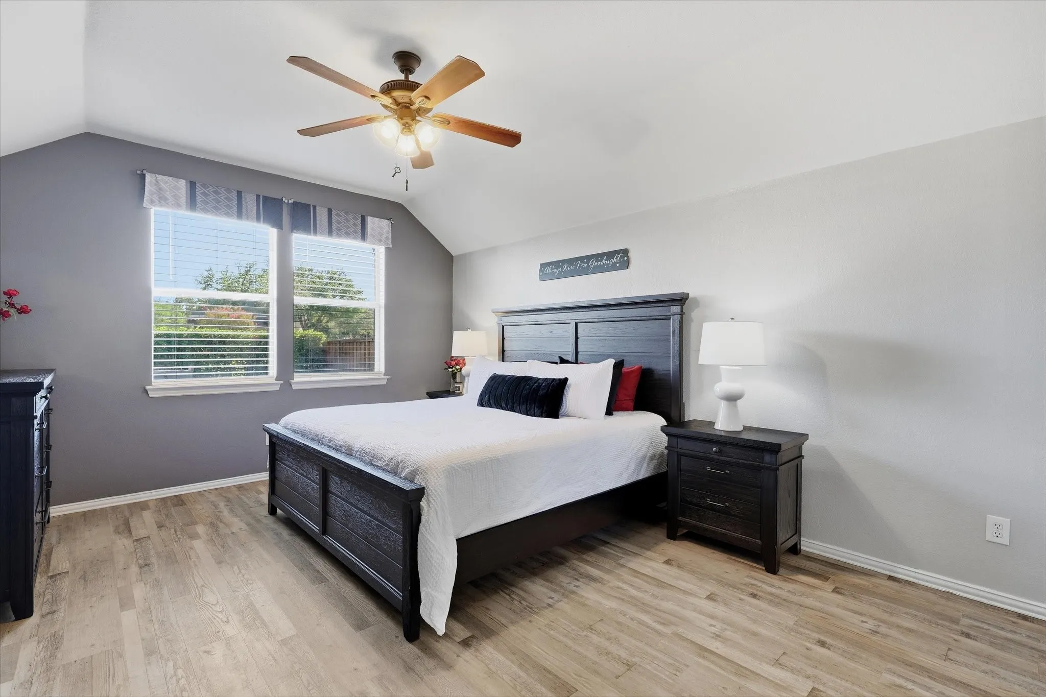 A secluded downstairs location & adjoining updated bath make the primary suite a comfortable retreat.