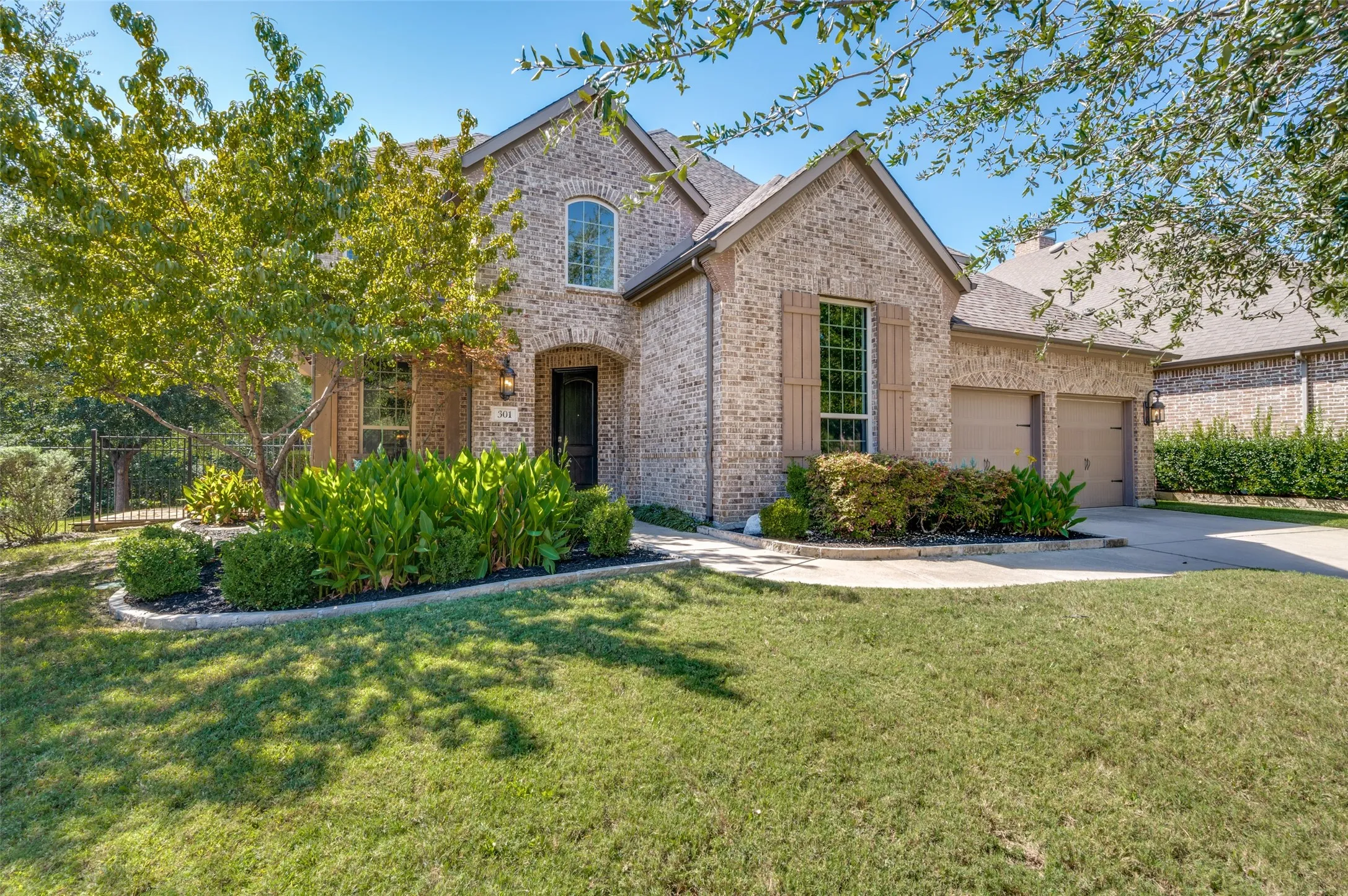 Beautiful curb appeal welcomes you to this five bedroom Highland home, tucked along a greenbelt on a quiet cul de sac in Stonebridge Ranch.