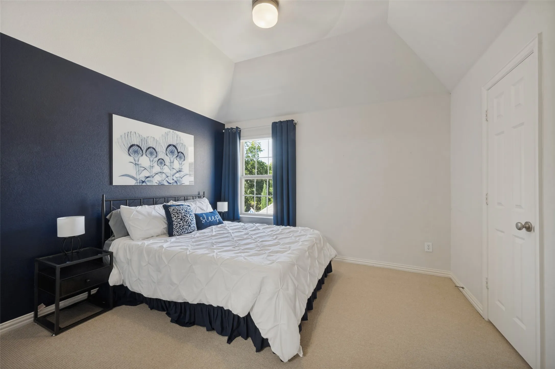 Upstairs secondary bedroom with private ensuite.