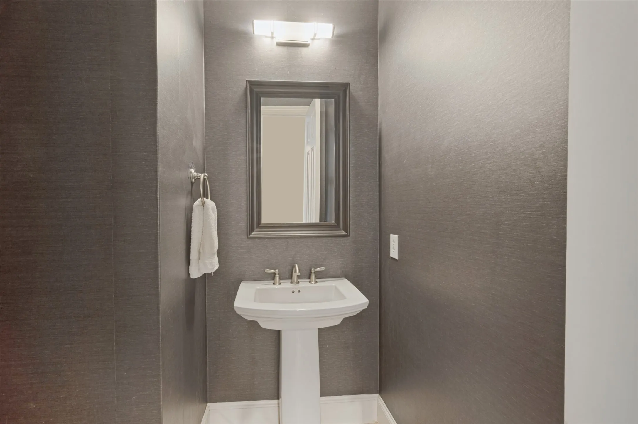 1st floor half bath for guest.