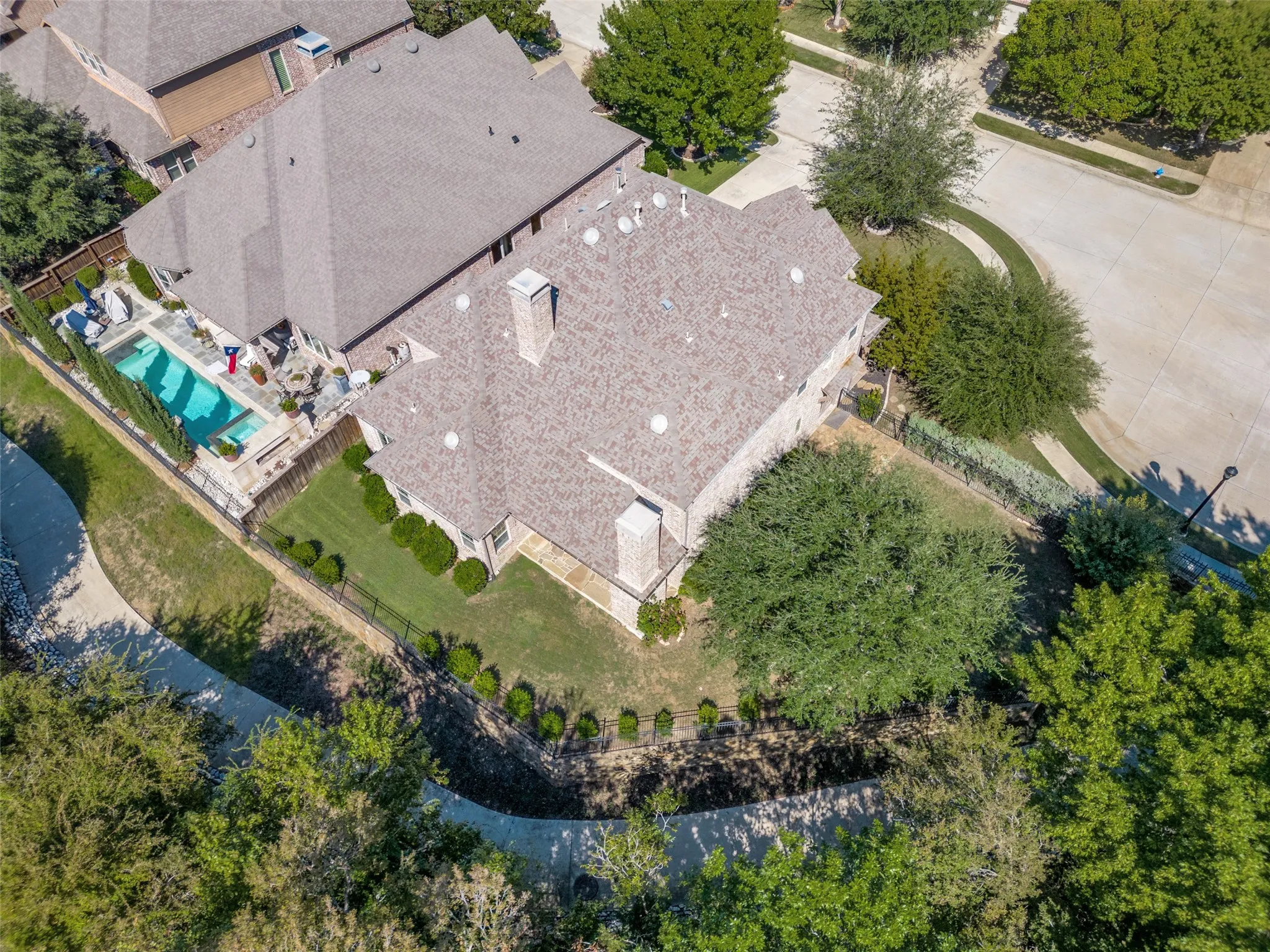 Beautiful curb appeal welcomes you to this five bedroom Highland home, tucked along a greenbelt on a quiet cul de sac in Stonebridge Ranch.