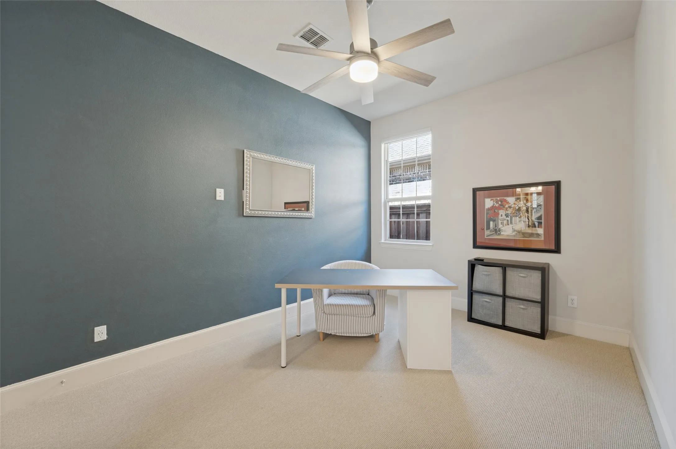 First floor secondary bedroom with a private ensuite bath.