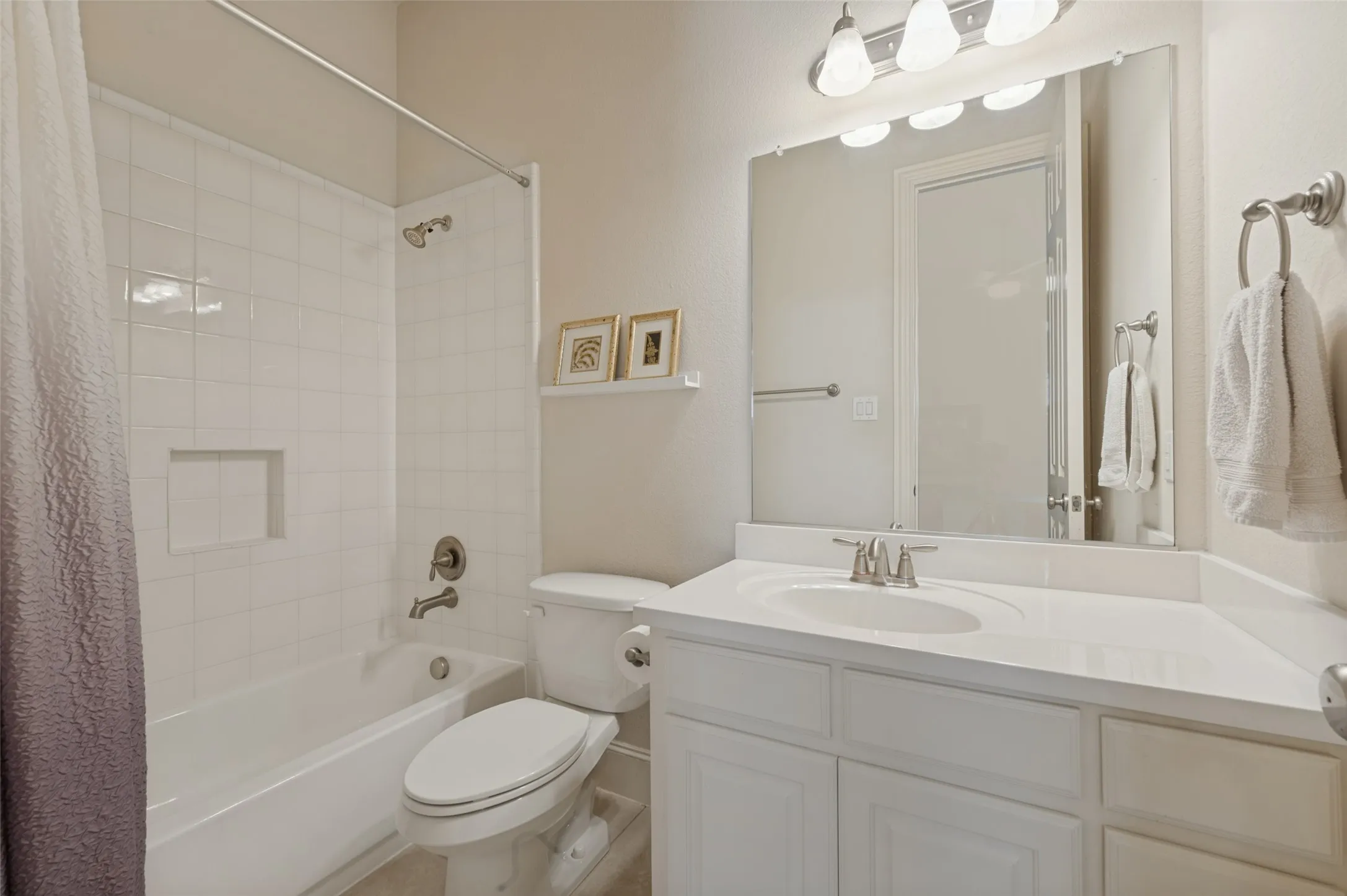 First floor secondary bedroom with a private ensuite bath.