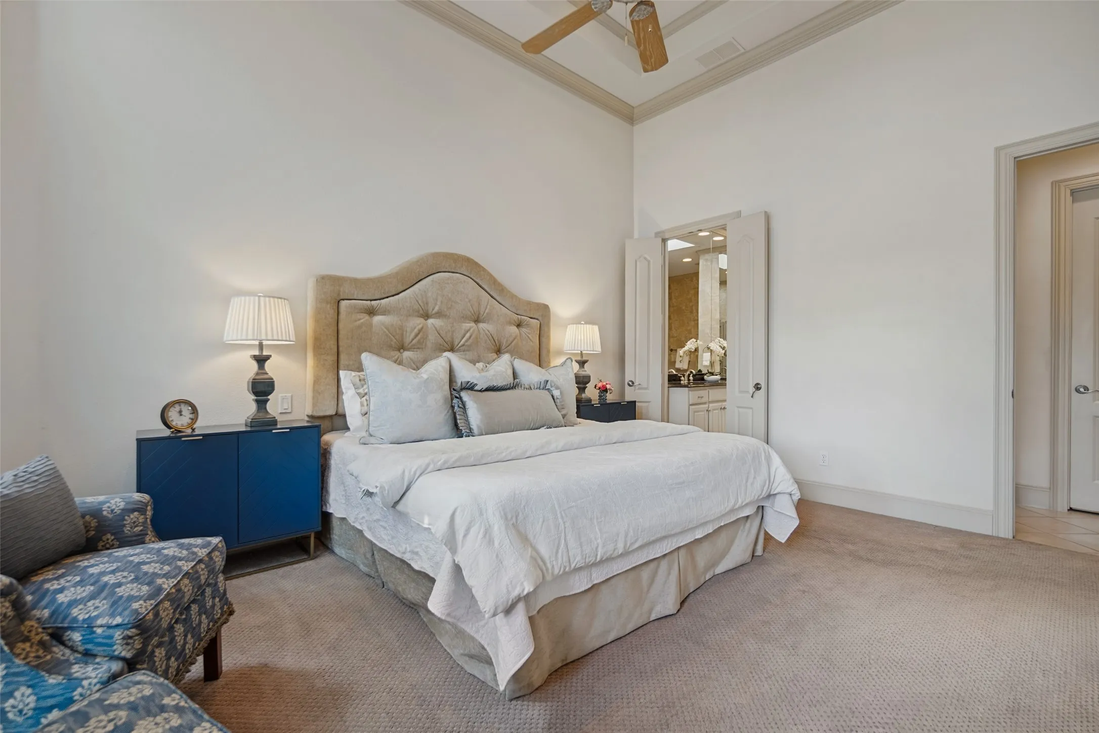 Primary bedroom with tall ceilings