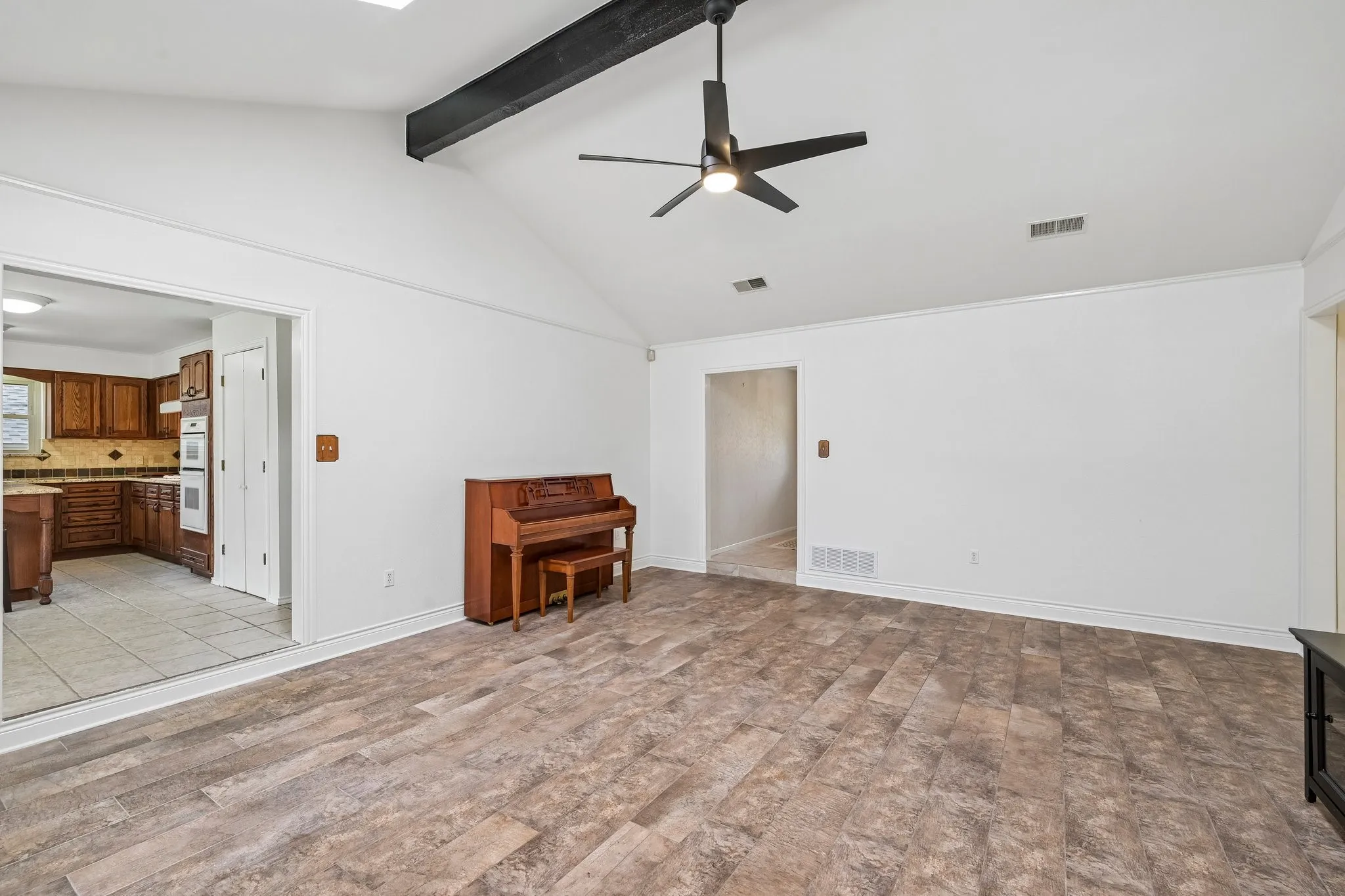 Another view of living room without staging