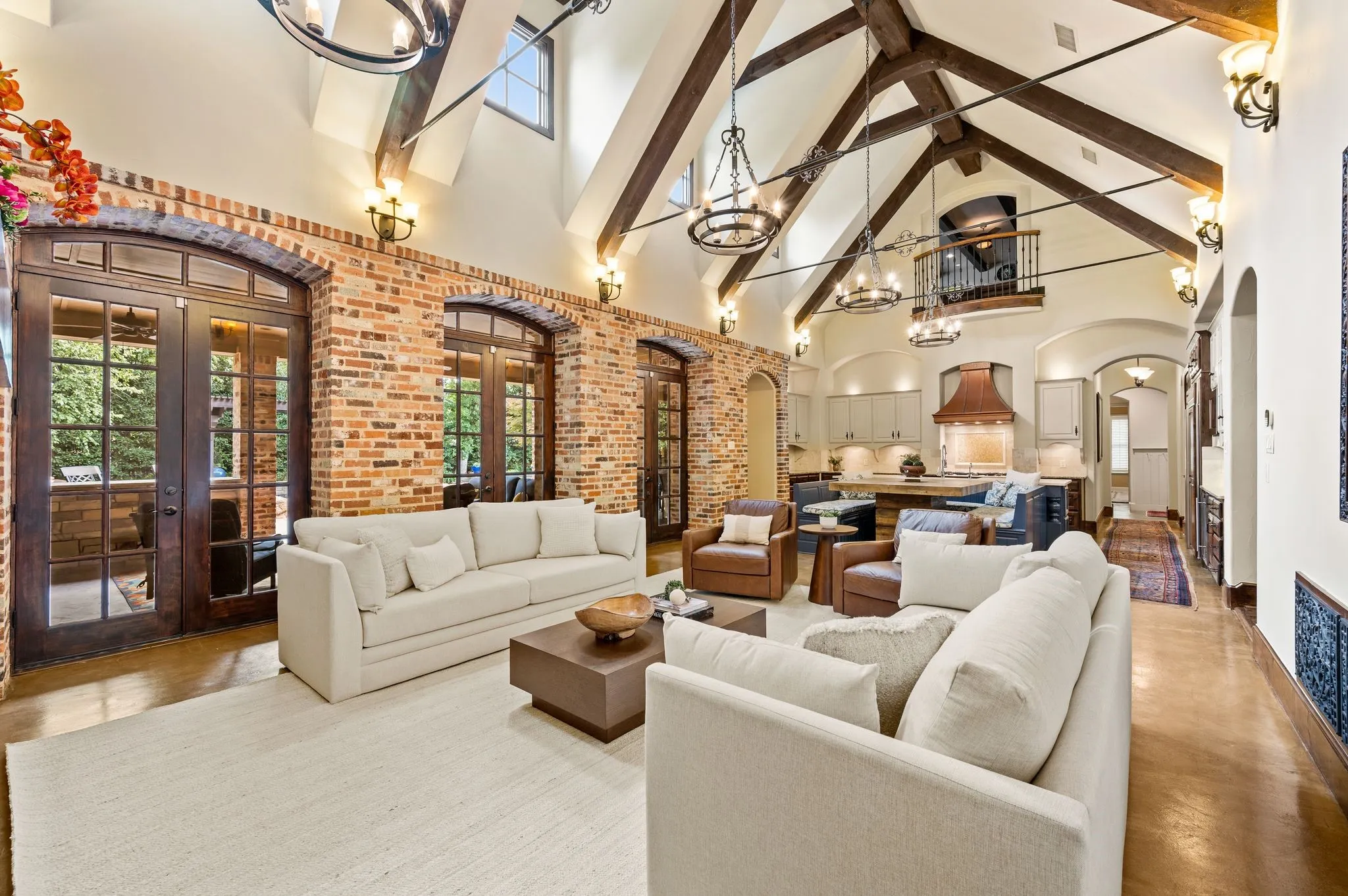 The home’s timeless architecture seamlessly complements modern furnishings, creating a sophisticated yet inviting setting ideal for grand-scale entertaining and intimate gatherings alike.