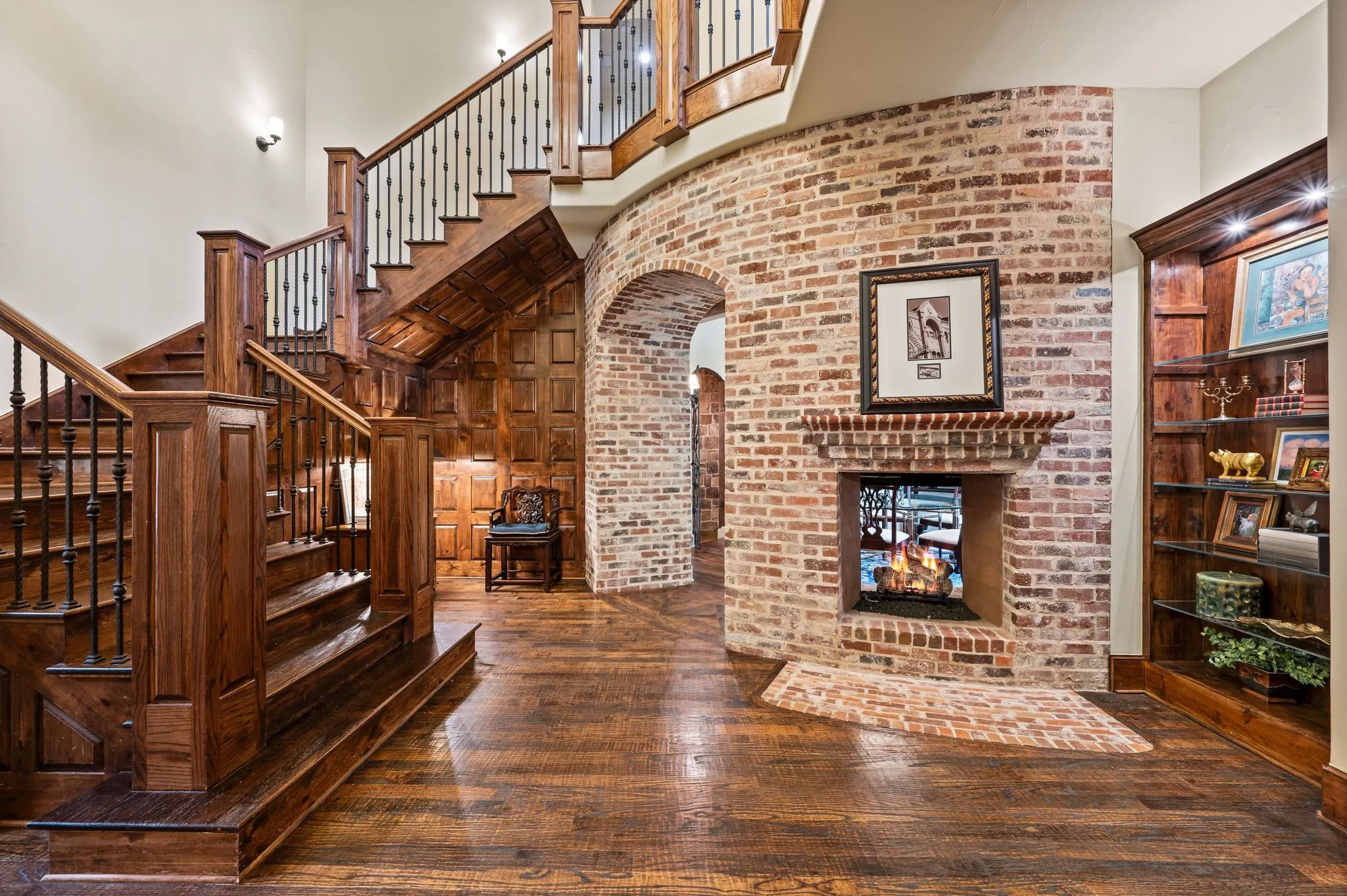 A welcoming entry foyer showcases exquisite custom millwork and antique Chicago brick accents, setting the tone for the home’s timeless character and architectural charm.
