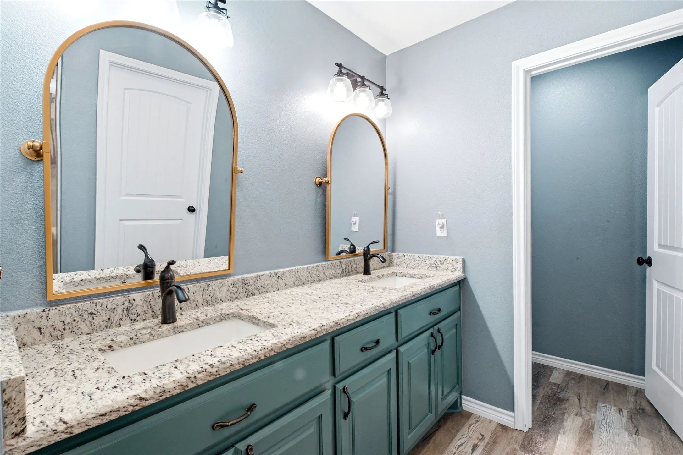 Double sinks and lovely finishes in primary bath