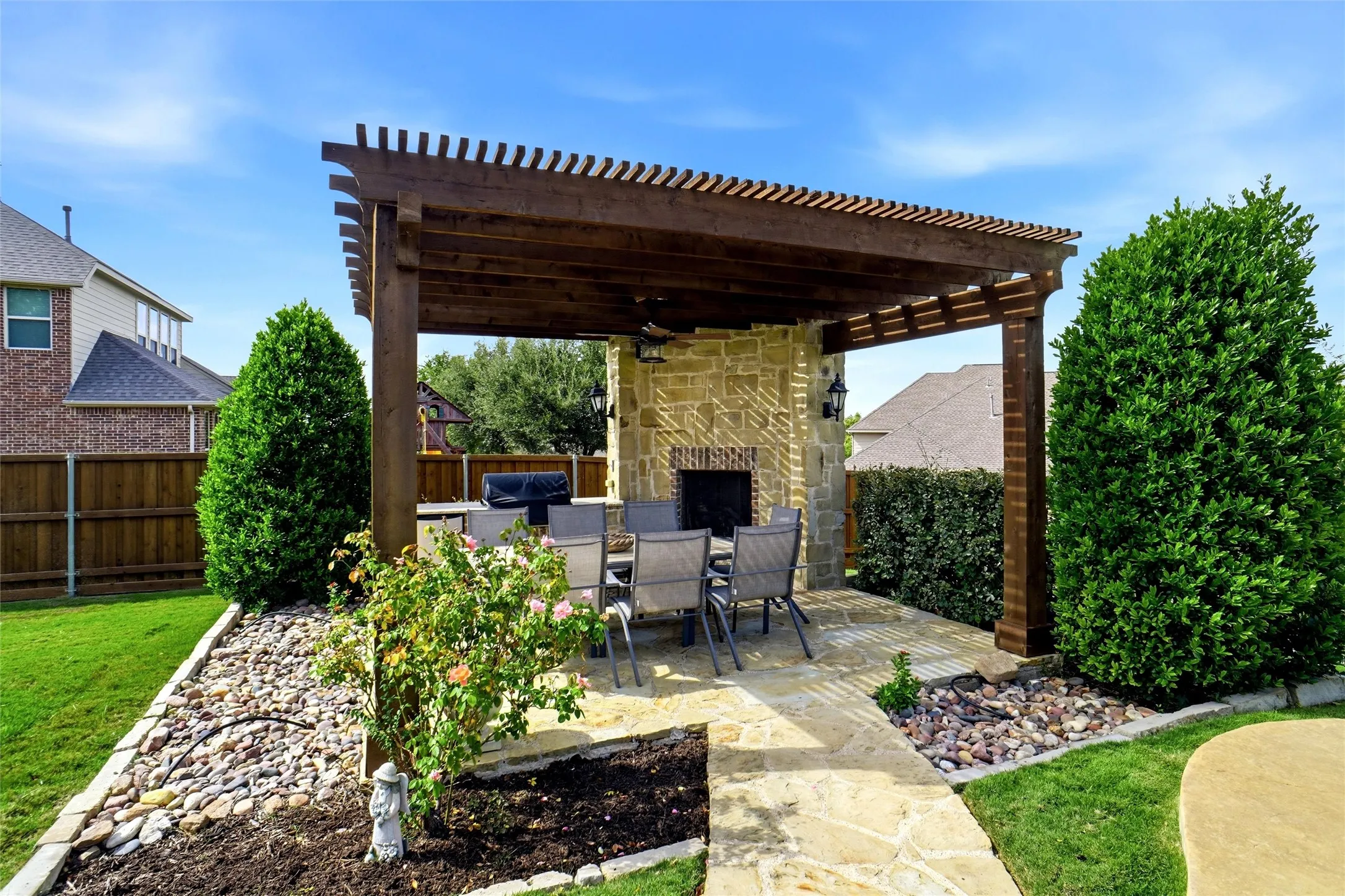 Outdoor living are complete with wood burning fireplace, rencently replaced builtin grill, mini fridge.