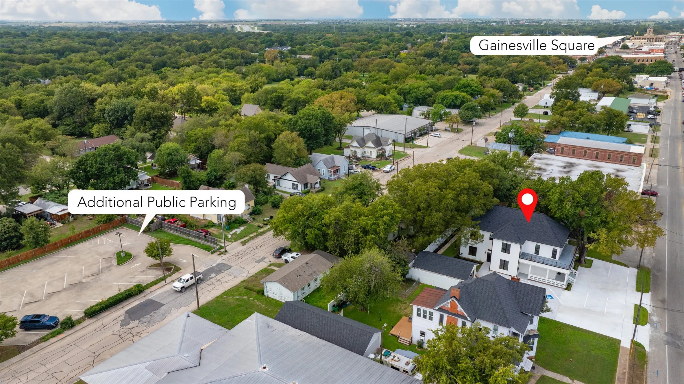 Aerial perspective featuring proximity to the Gainesville Downtown Square and Additional public parking.