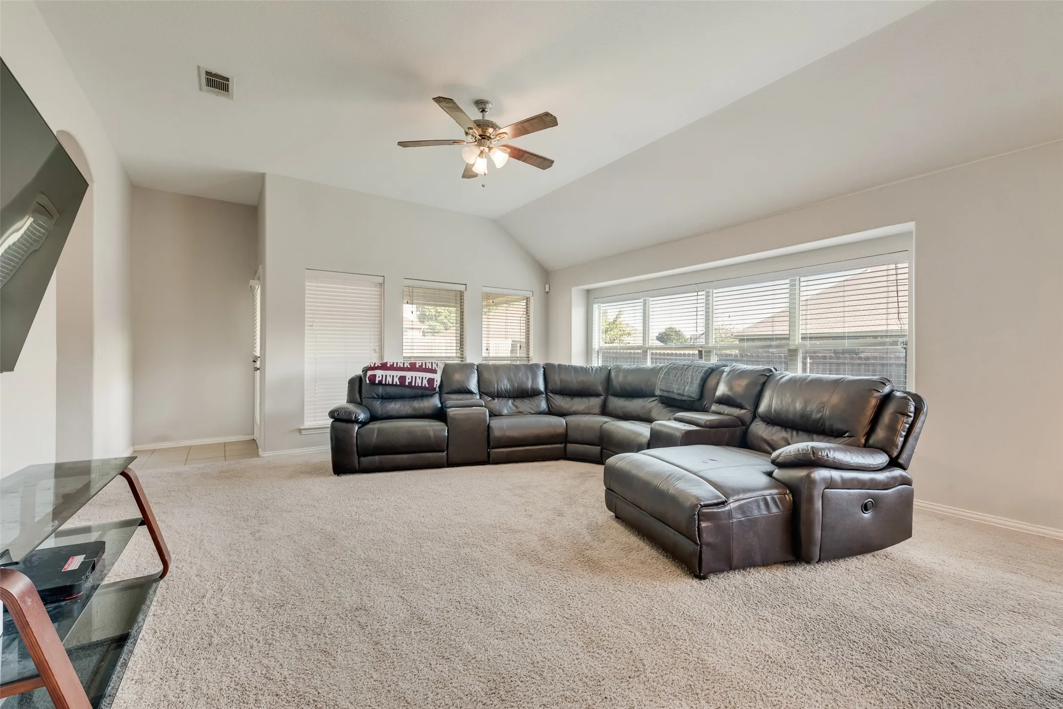 This home has a spacious living area perfect for a movie night!