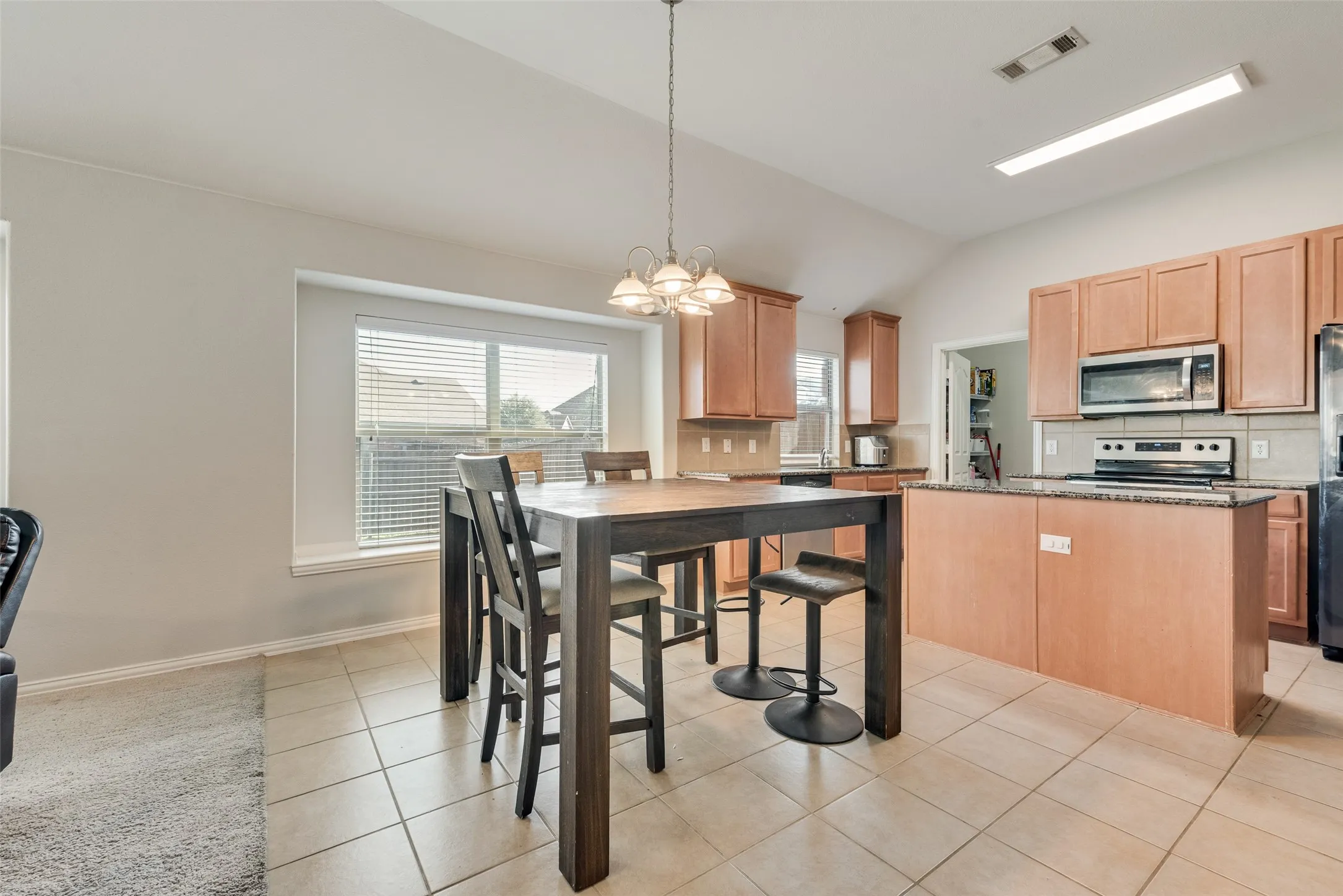 Kitchen opens to the living room!