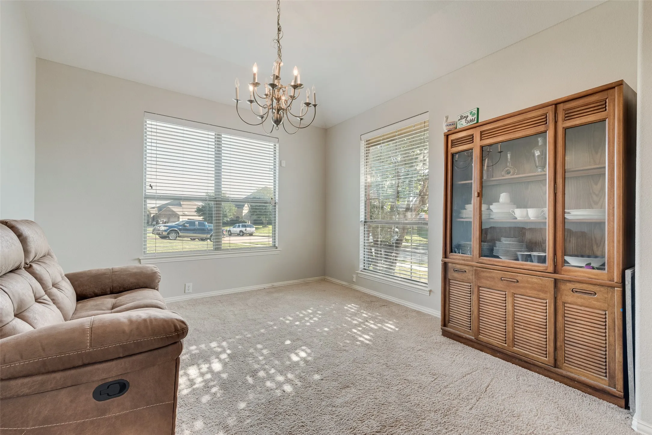 The sitting room offers flexibility and can be used as a formal dining room!