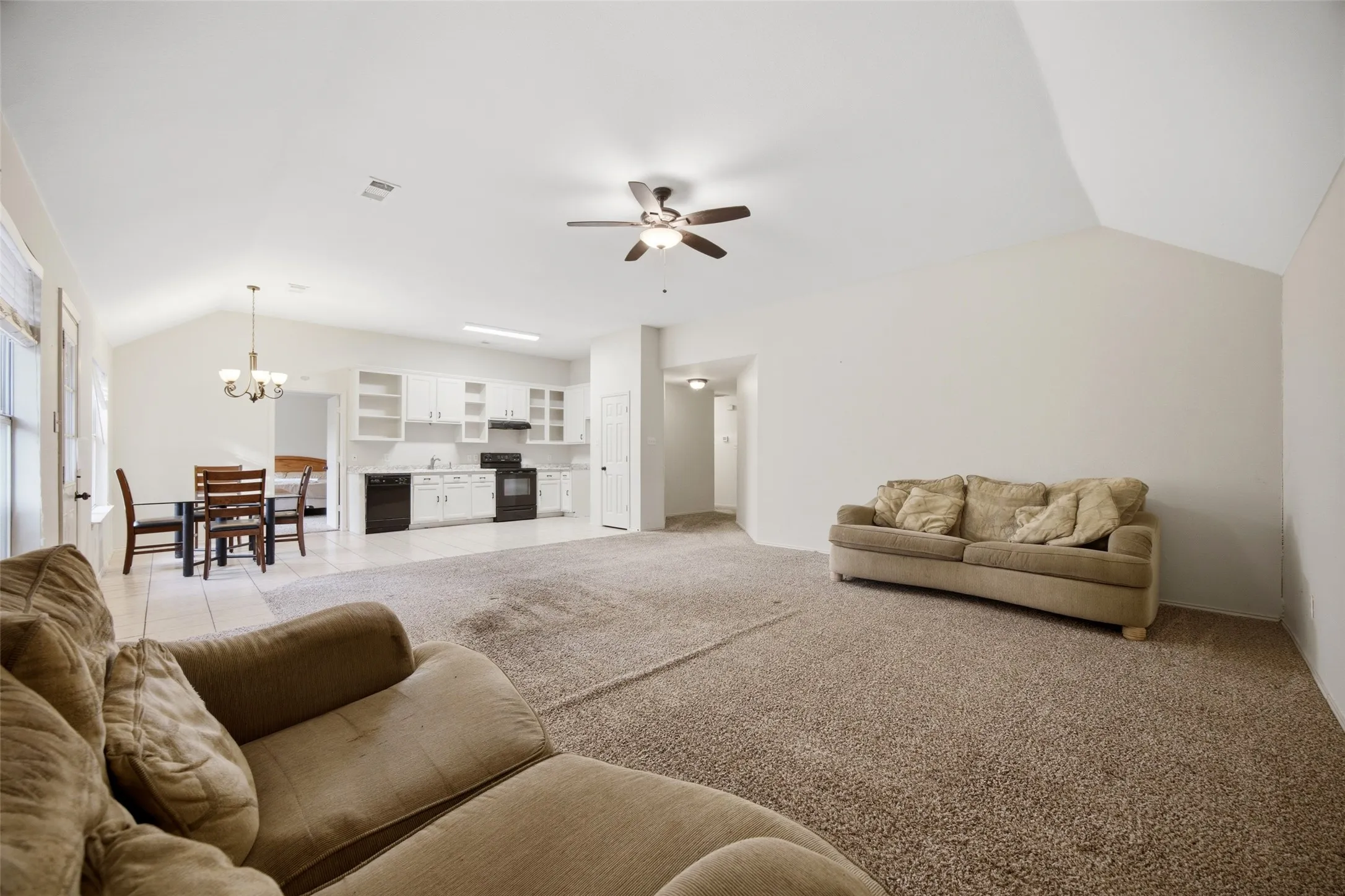 The living room is open to the kitchen