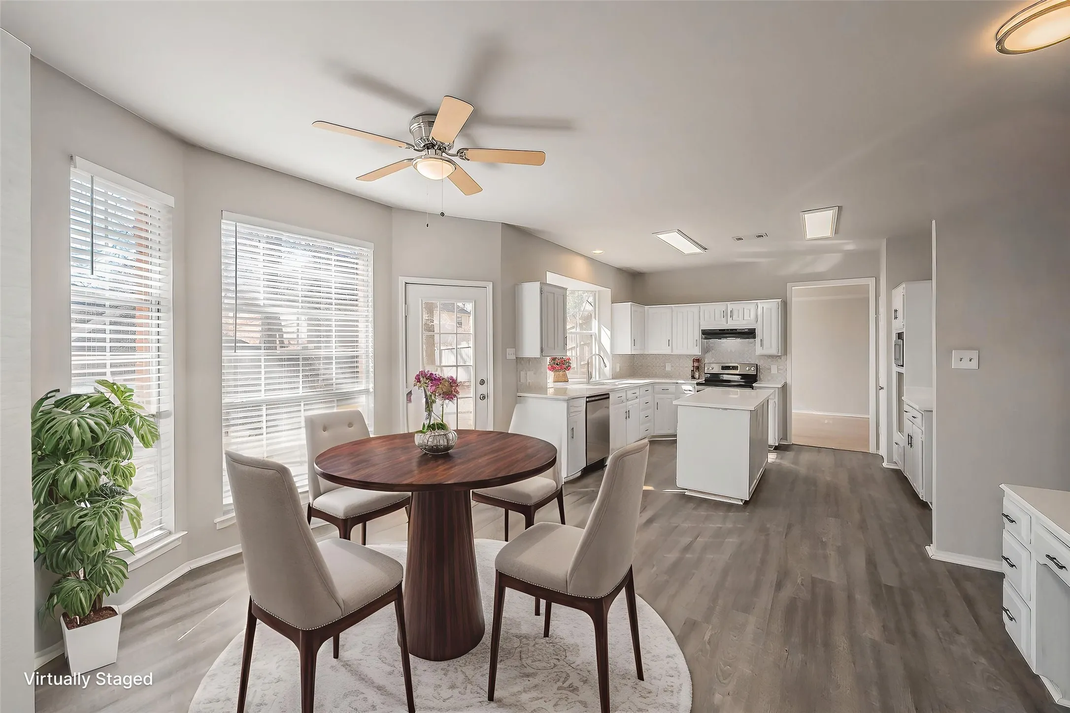 Virtually staged breakfast area.