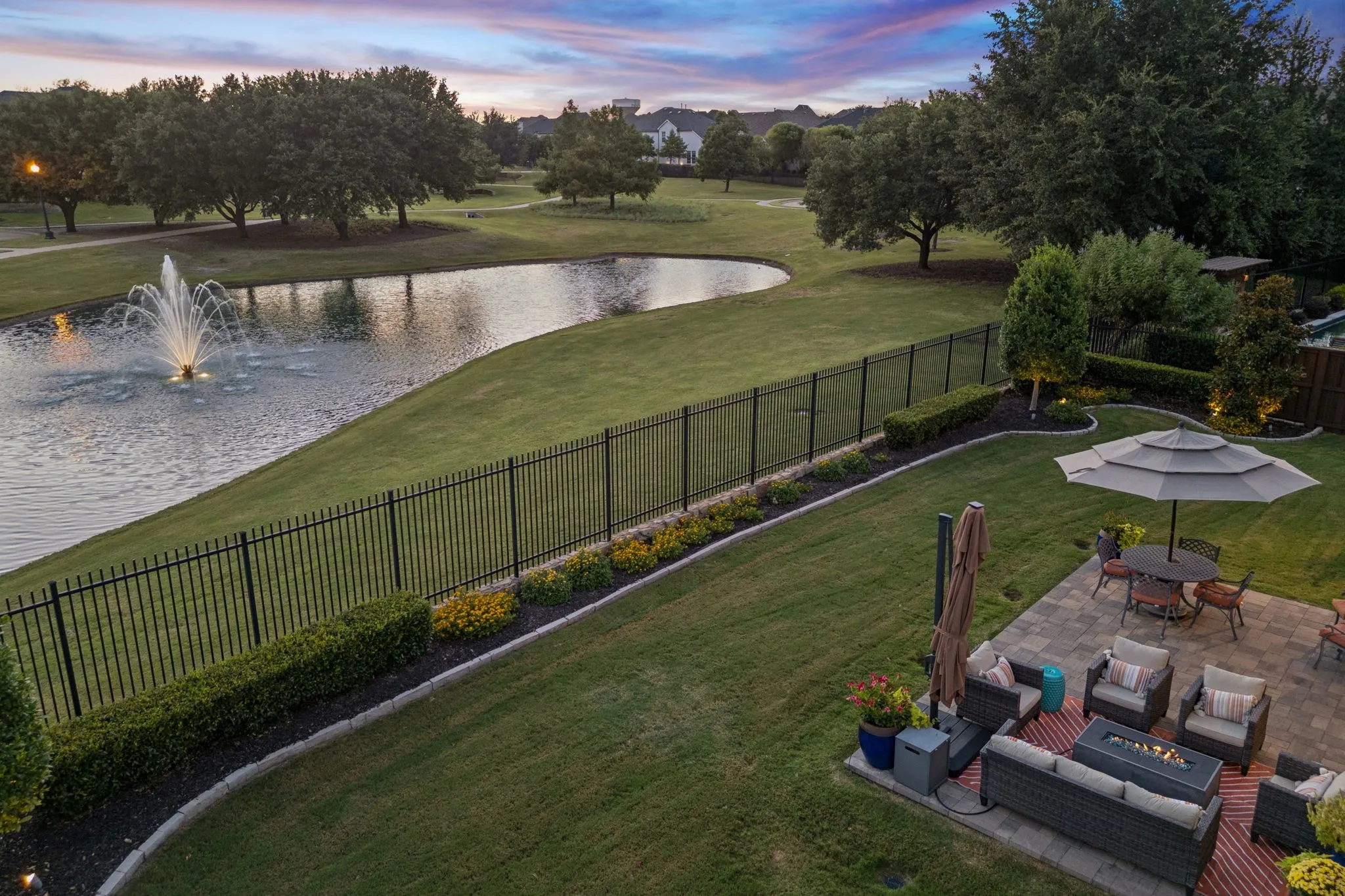Stunning view up the greenbelt across the lake with the fountain!
