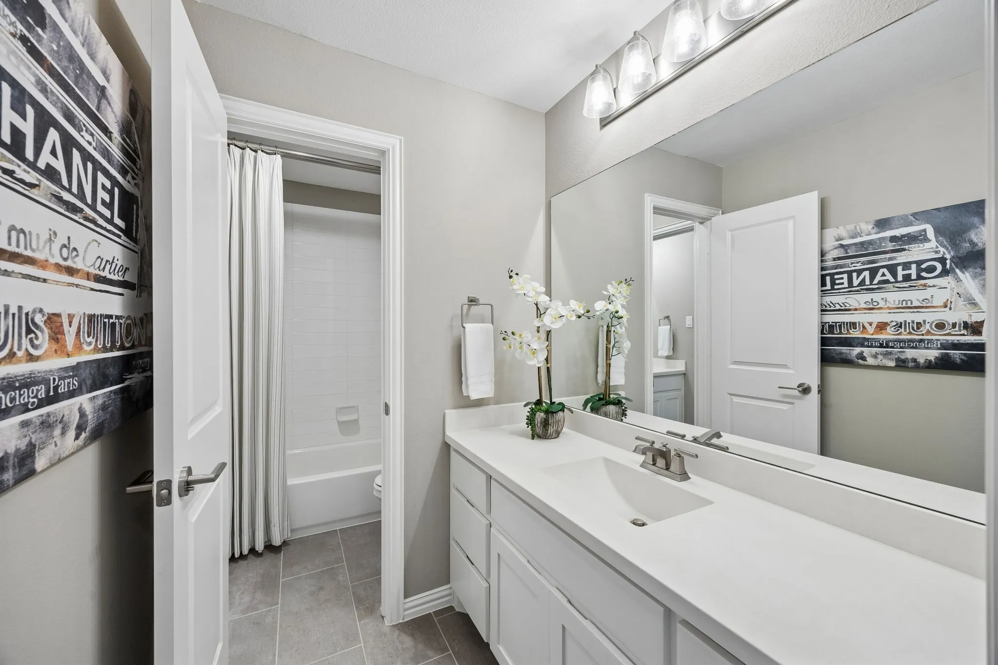 Jack and Jill bath located between bedroom three and four.