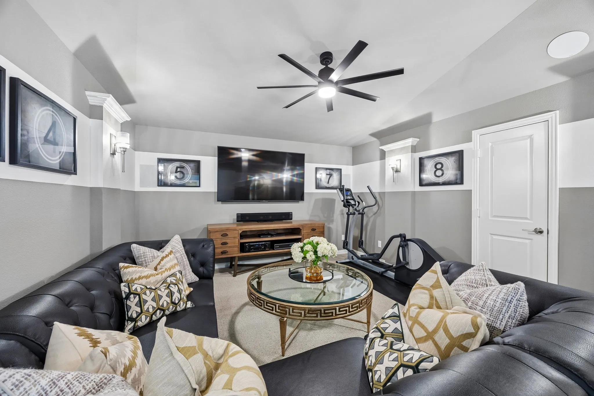 You'll love watching your favorite movies or sports teams in this comfortable media room.
