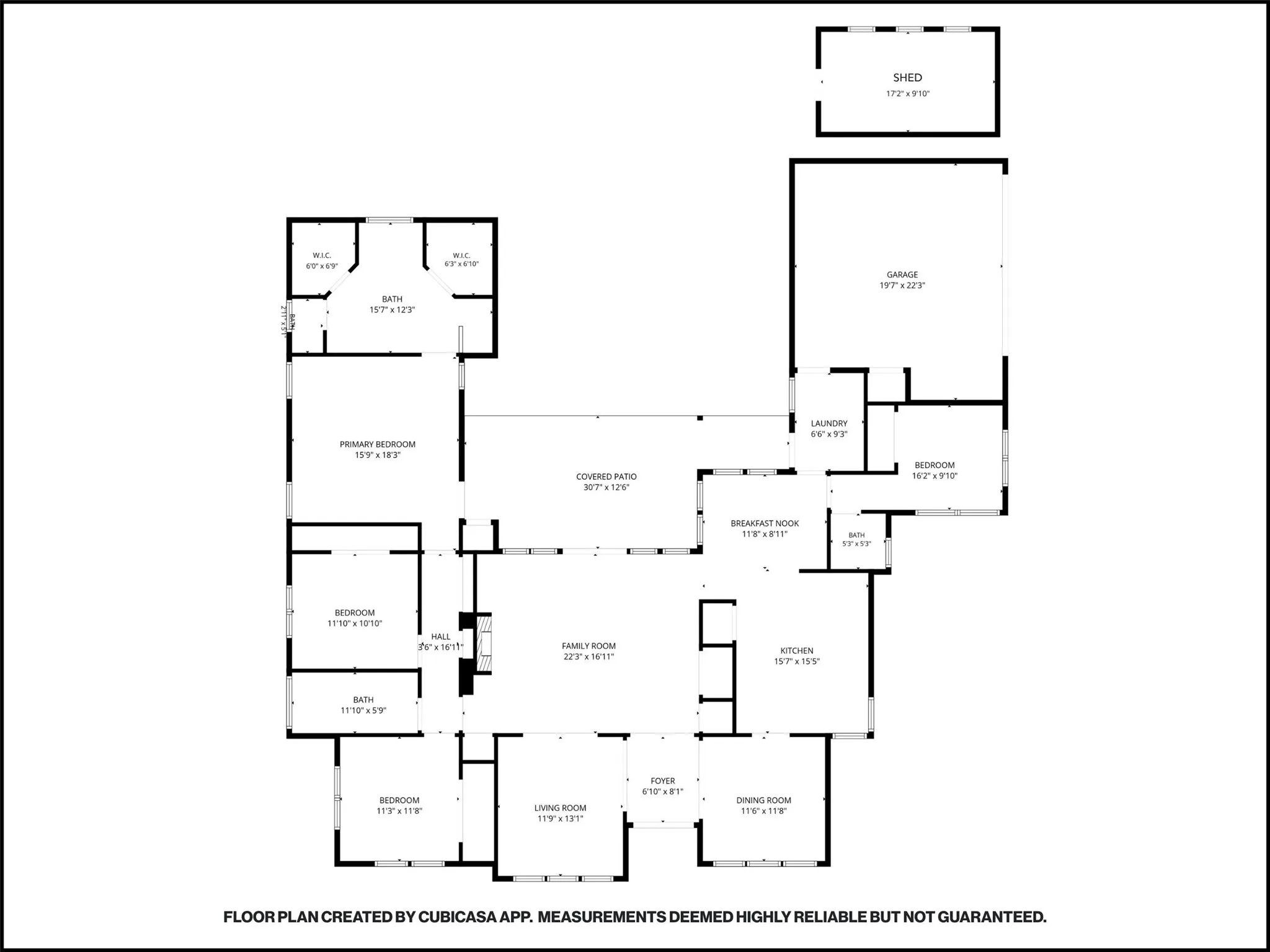 Floor plan: single-story layout with four bedrooms, living, dining and family rooms, attached garage and detached studio.
