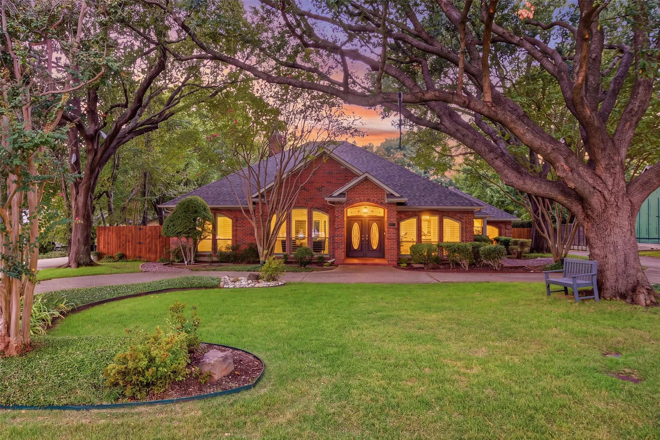 Welcome home to 17415 Marianne Cir! Mature oaks, a circular drive and classic brick curb appeal.