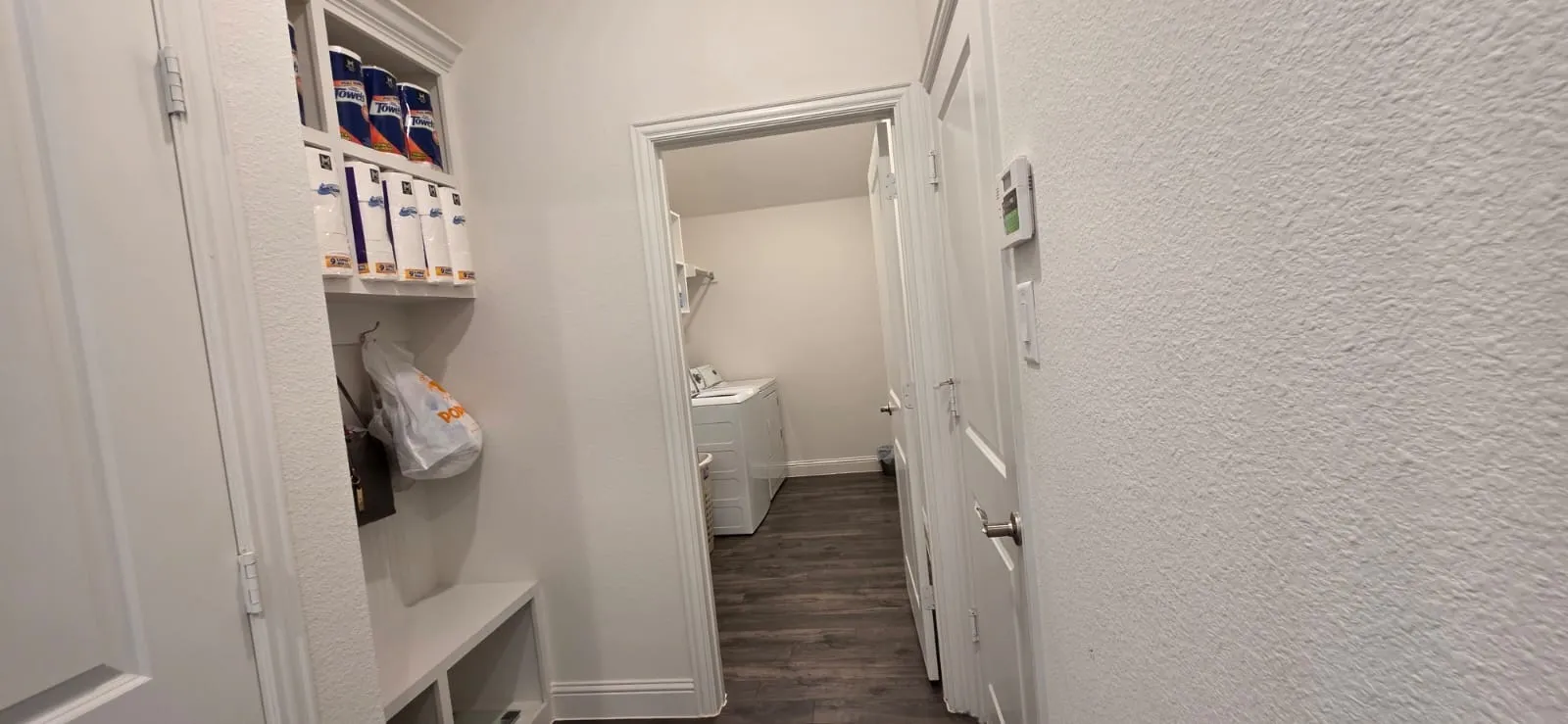 Built-in storage bench with overhead shelving