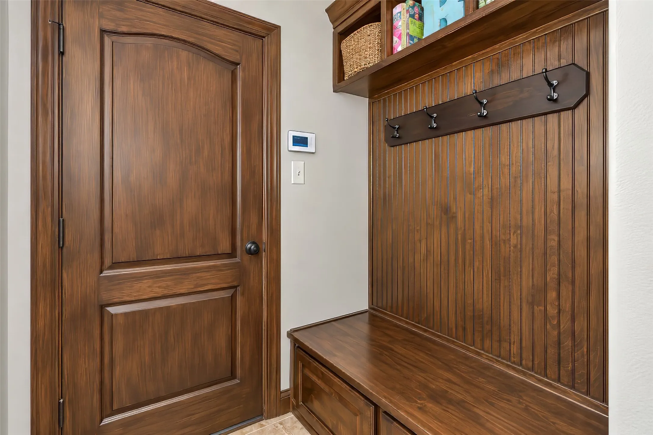 The mud room area is conveniently located off the garage entry.