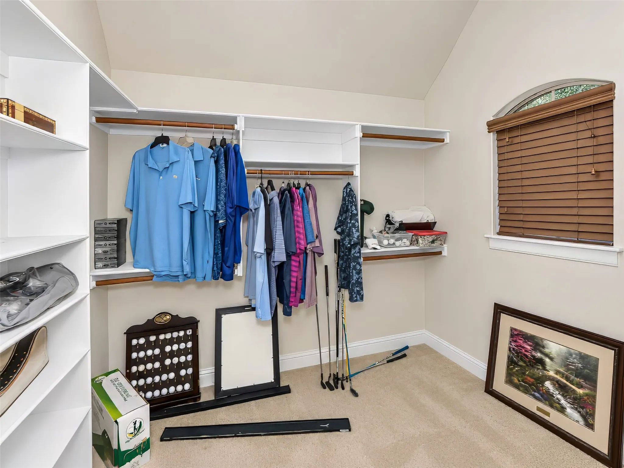 A large walk in closet off an upstairs bedroom is almost large enough to be a room all by itself!