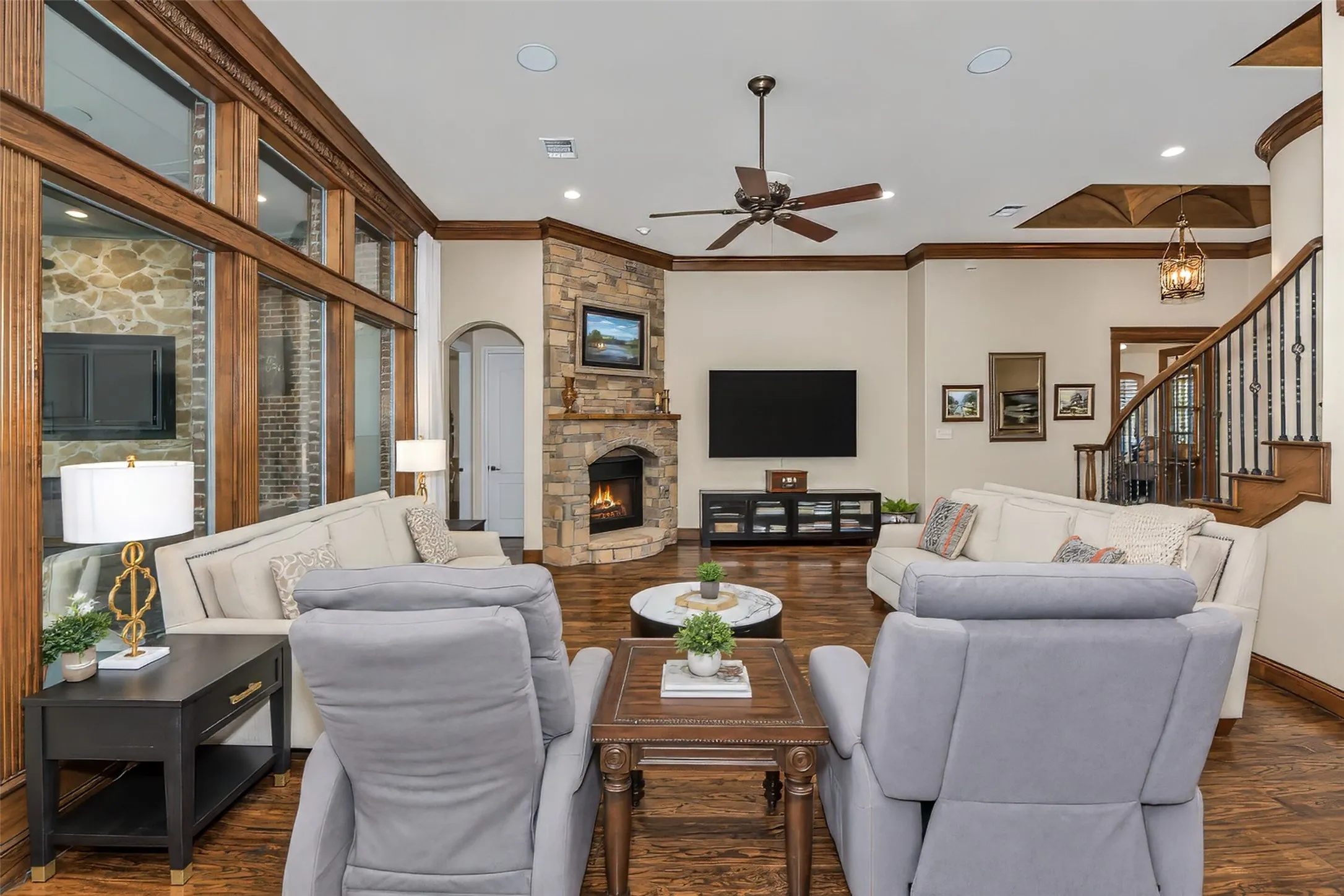 Great room features tall ceiling and generous proportions.