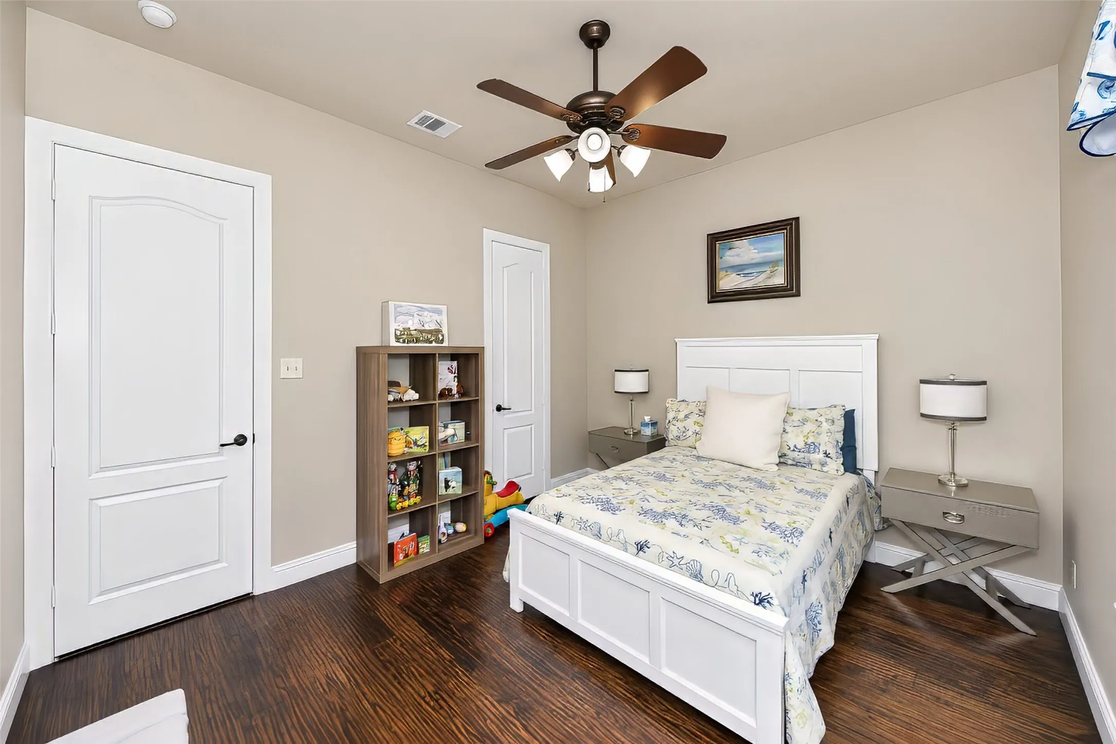 Also featured in the downstairs guest bedroom is a walk in closet.