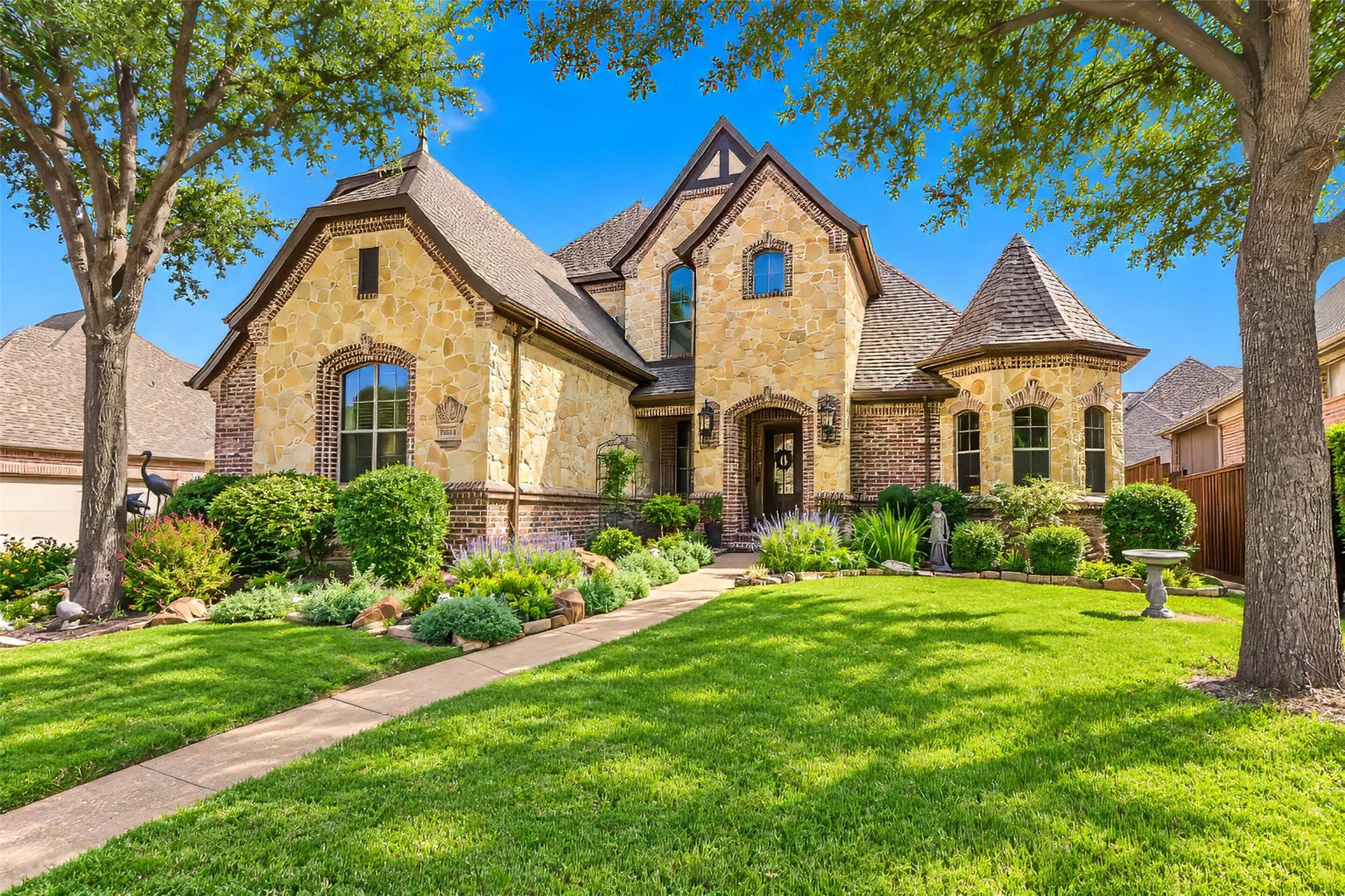 Welcome to 6620 Cedar Grove, a luxury home with amazing detail and curb appeal!