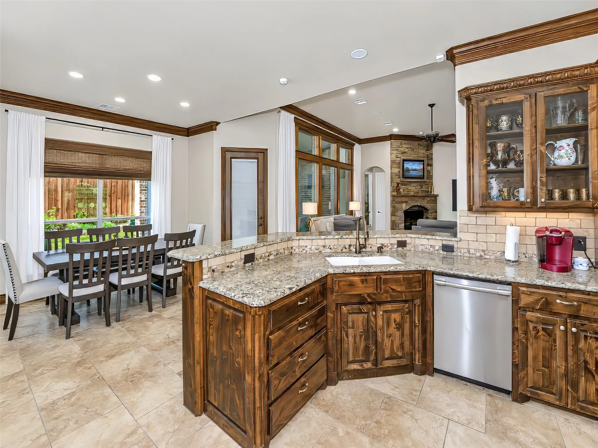 Multiple eating areas are available in the kitchen area, including a breakfast bar and large breakfast area overlooking the back yard.