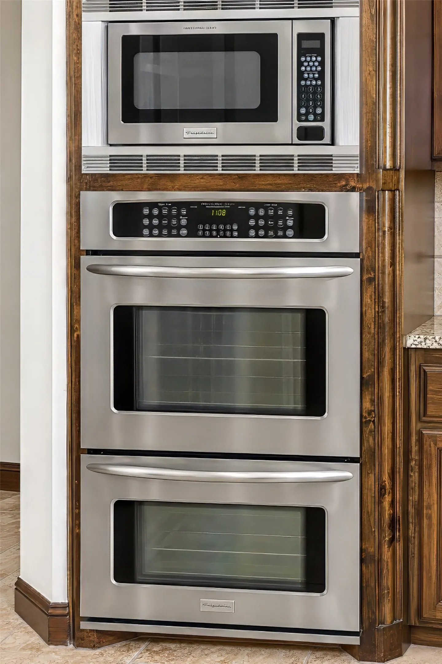 Part of the gourmet appliance package is a double oven and microwave.