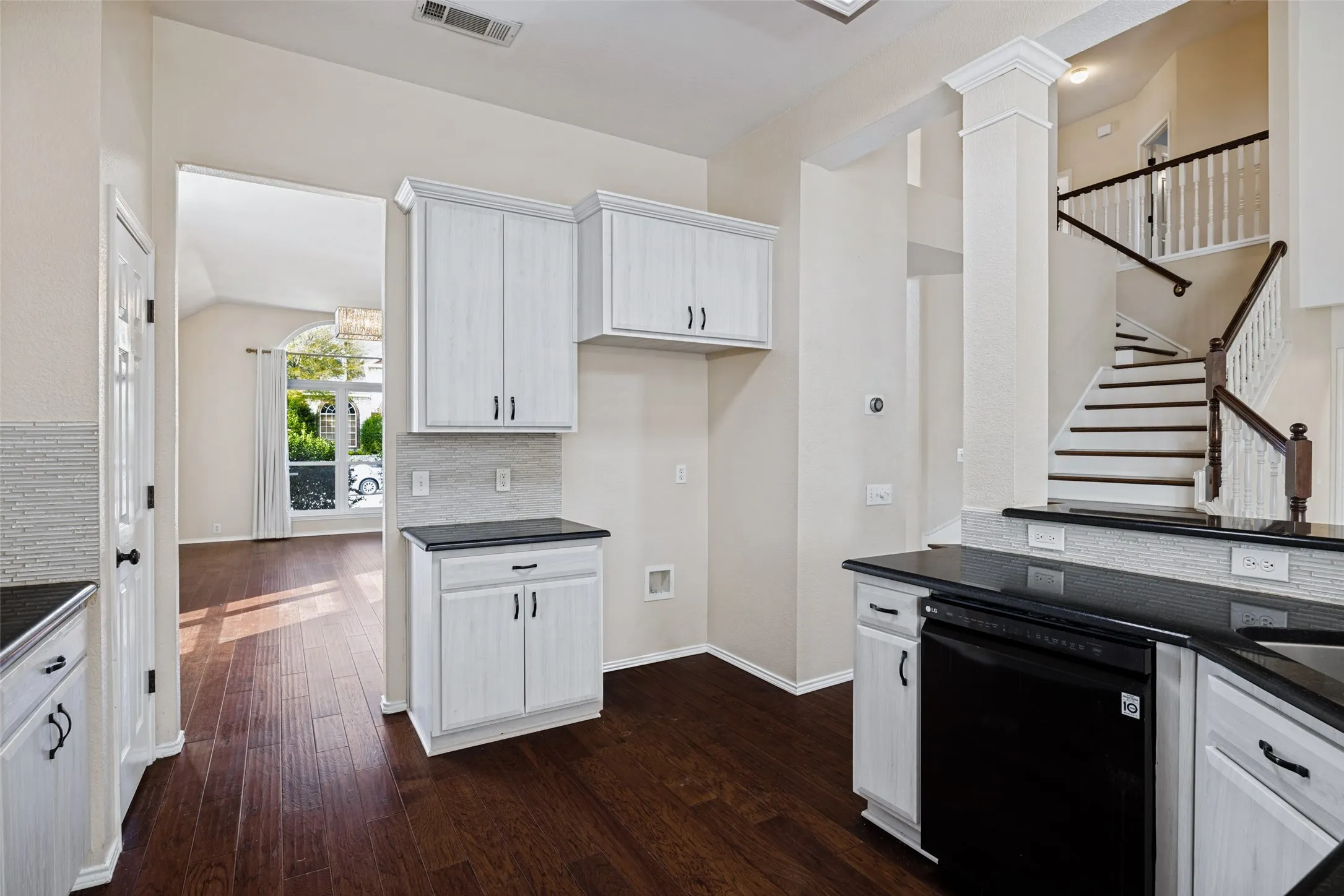 Kitchen featuring new cabinets and granite counters