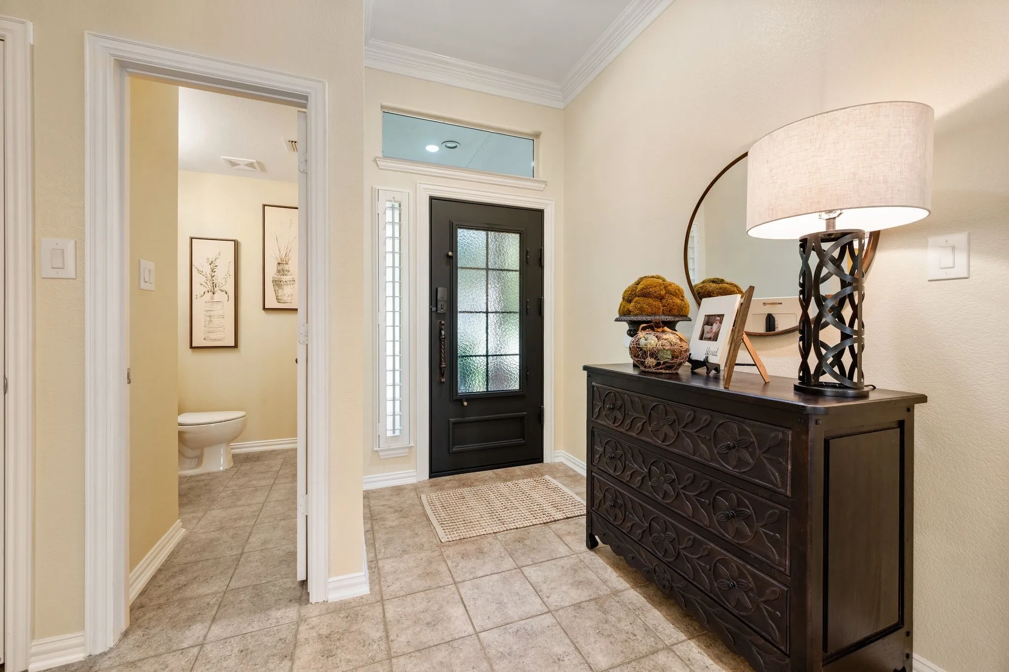 Formal entry with recently added iron and glass front door