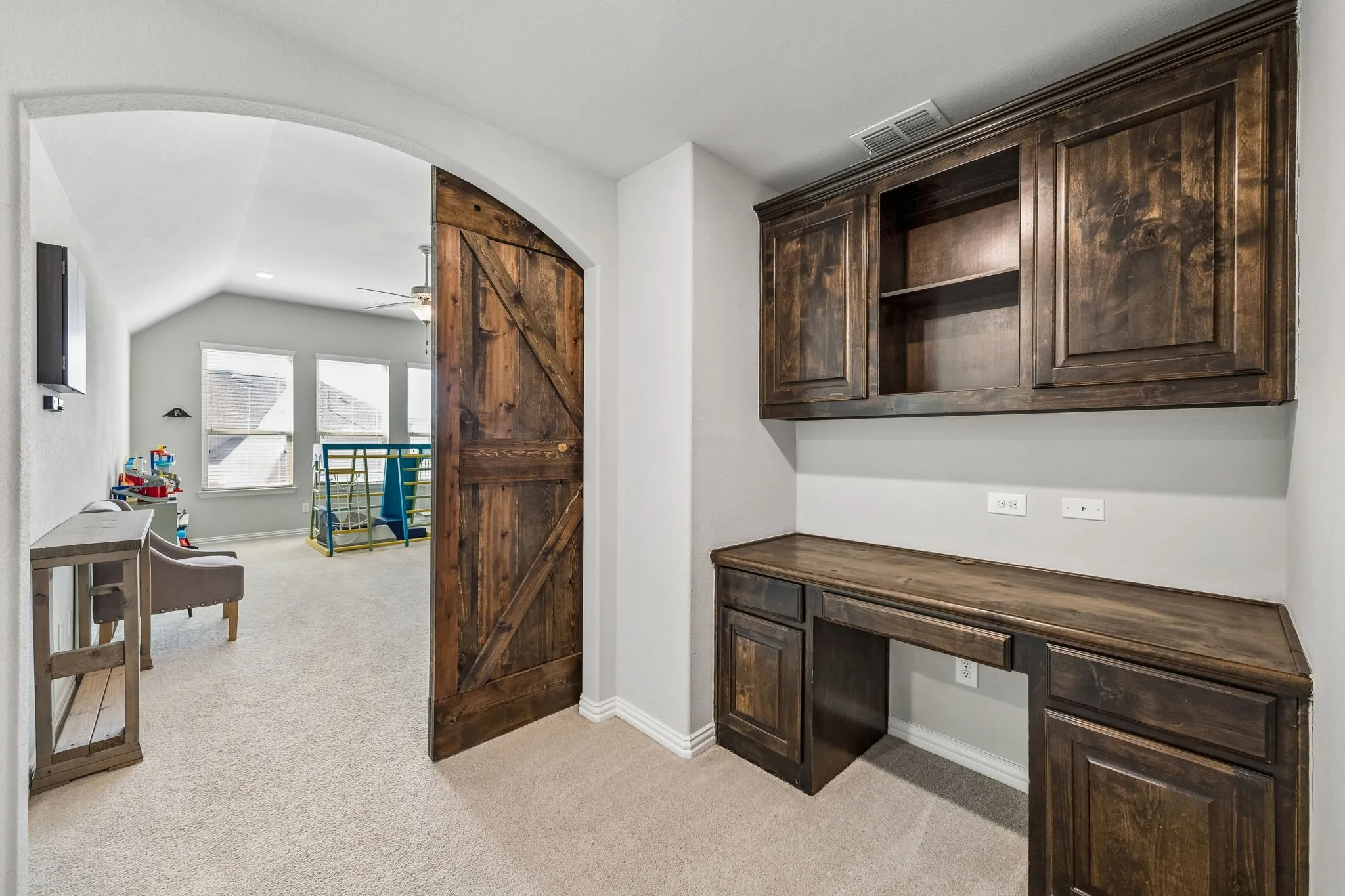 A great homework area or an additional office upstairs with built-ins.